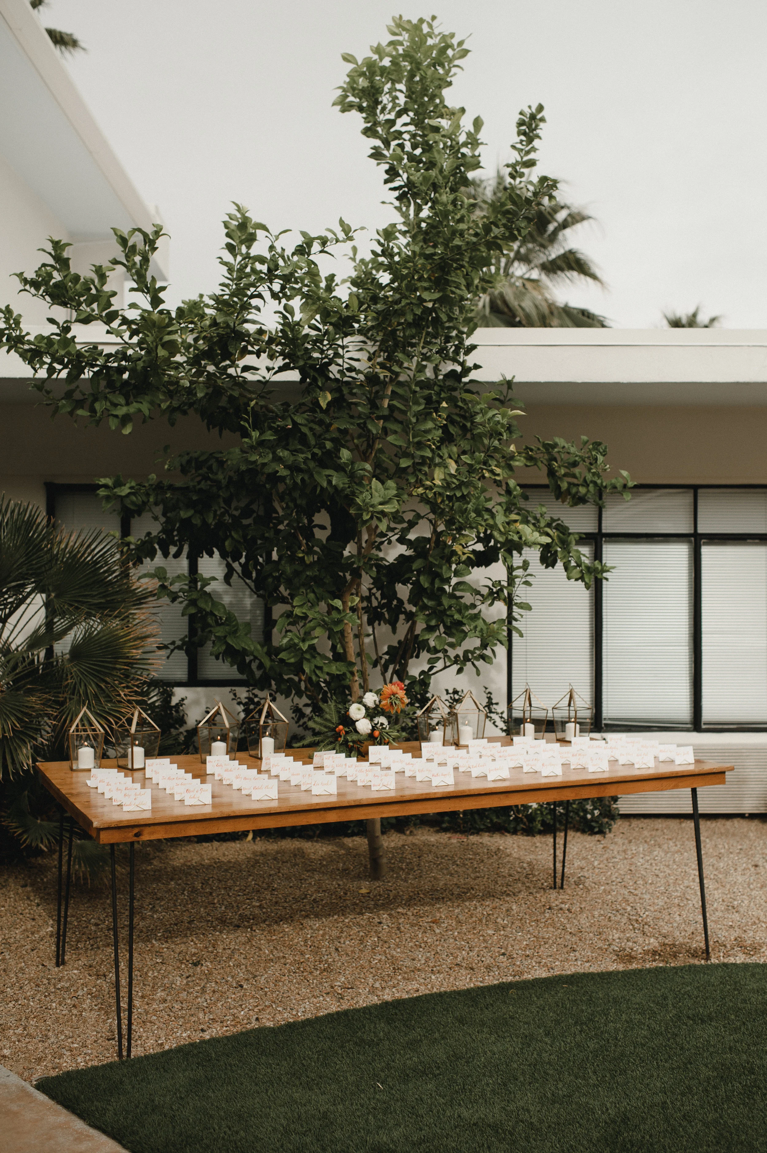 Placecard table at wedding entrance || Orange Blossom Special Events