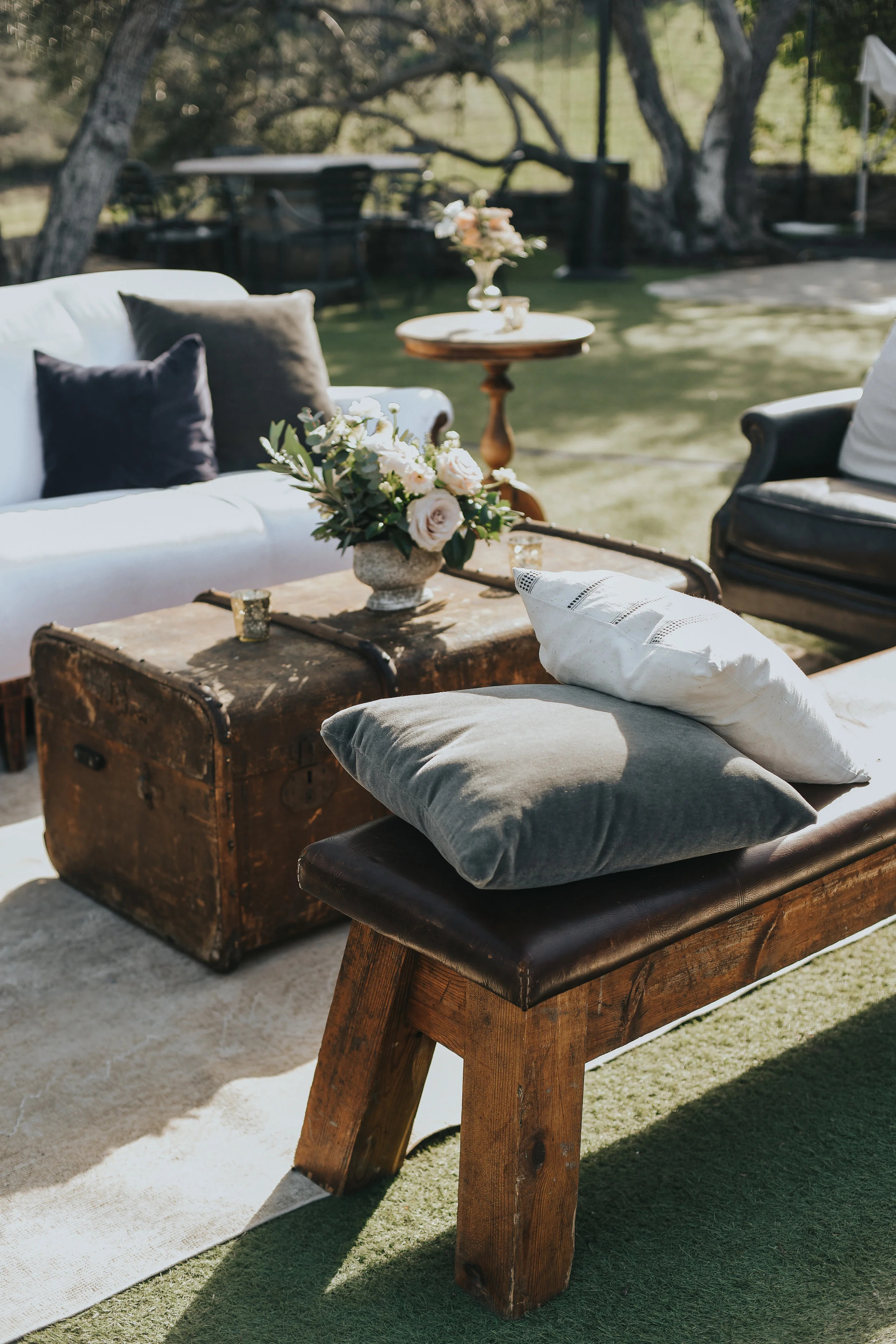 wood table, blue sofa, wedding furniture || Orange Blossom Special Events