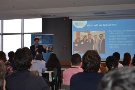 Photo of Ryan Buck speaking to Colombian Fulbright Scholars