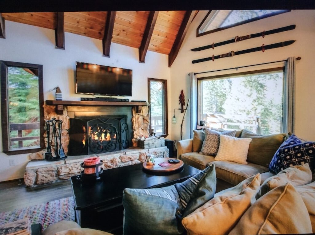 interior of a cabin with fireplace 