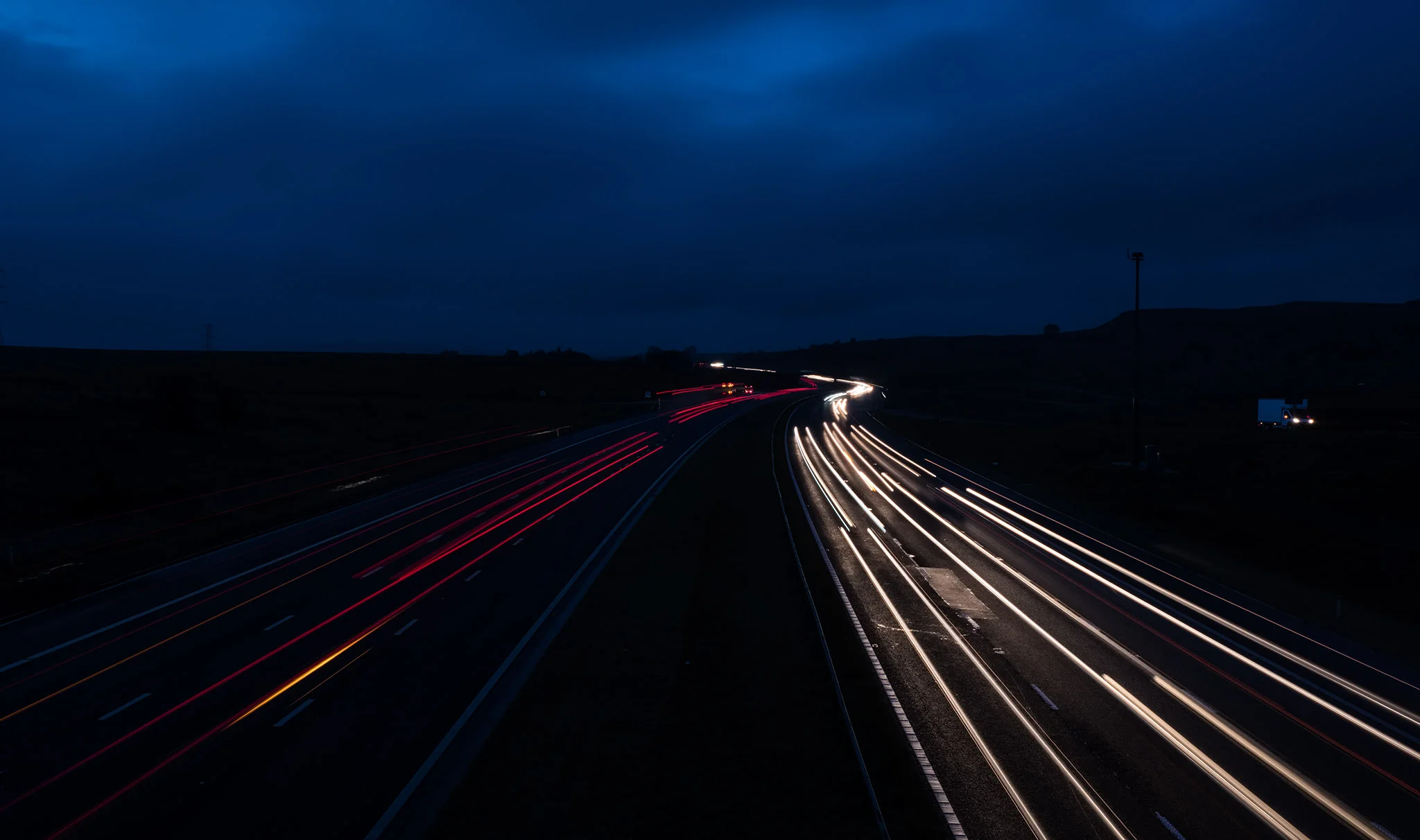 Light Trails on the M6 - shot in heavy wind and rain… without a tripod… as I forgot that I didn’t have a base plate on the Fuji!