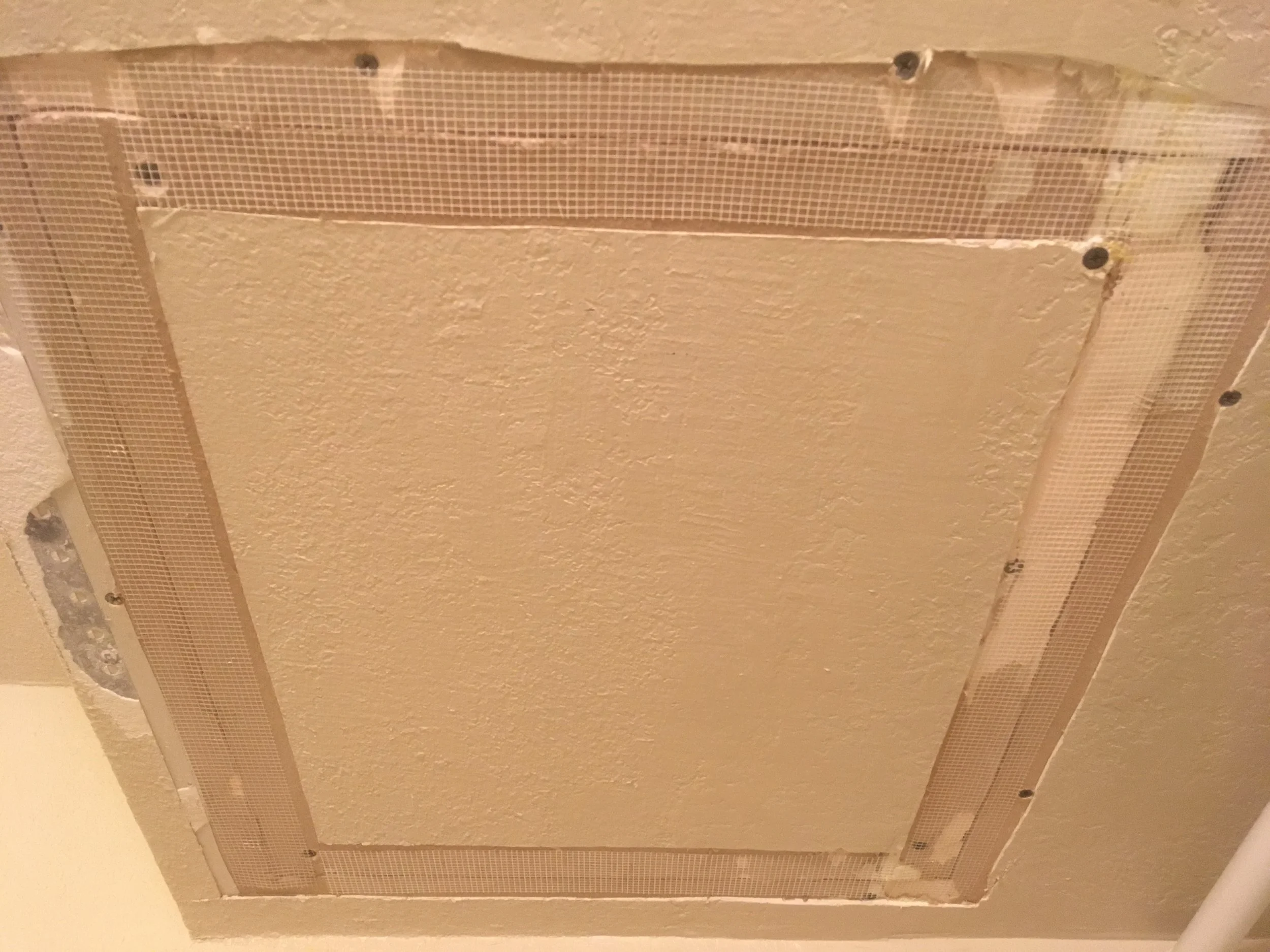 Drywall patch ready for mud and texture