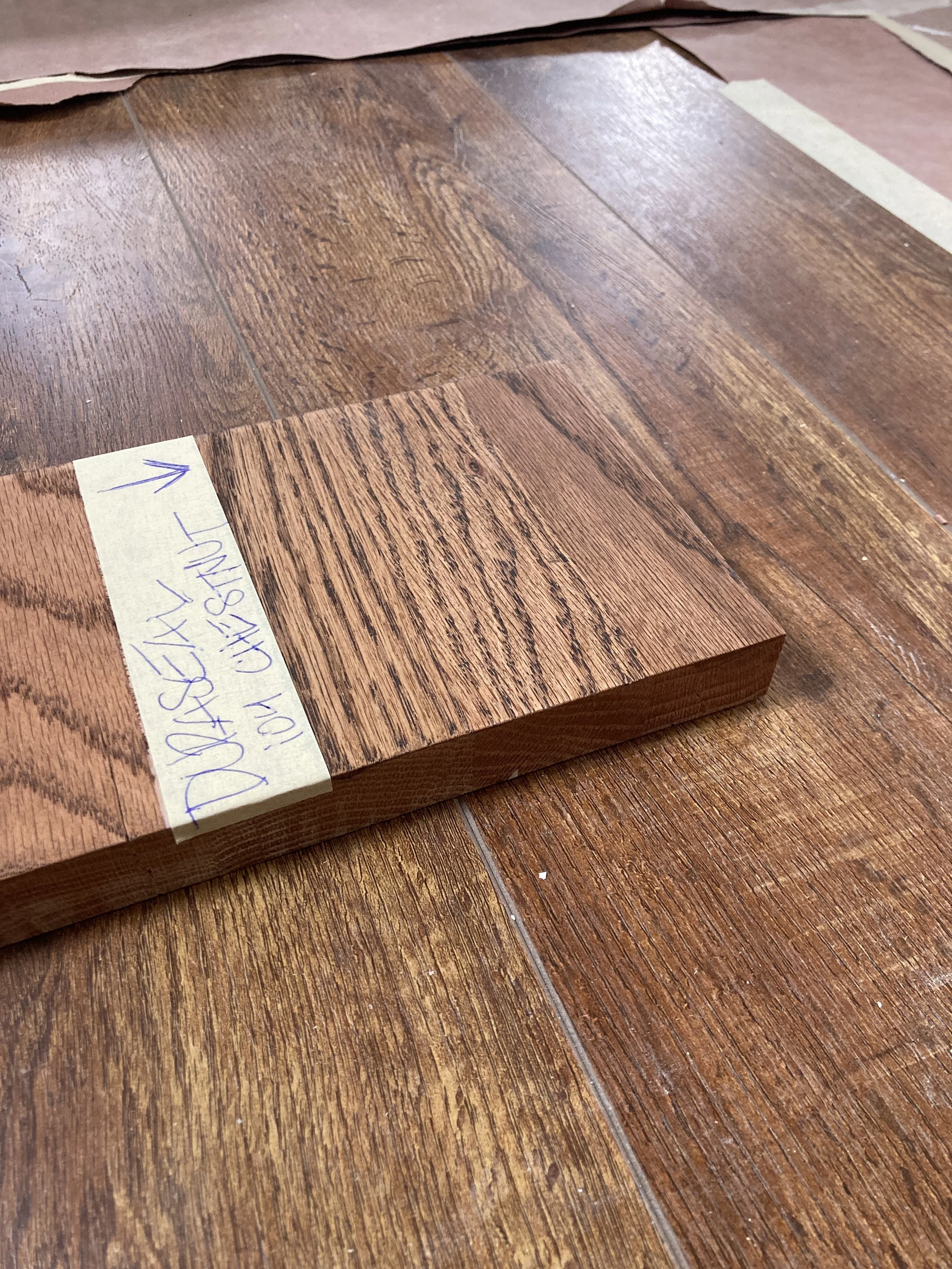 Oak stair tread stain matched to vinyl floor