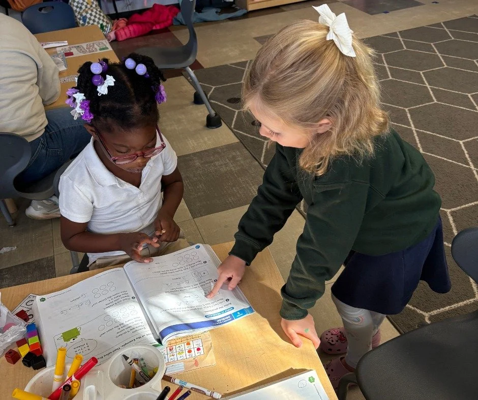 This is the Home of the Curious and Empowered Learner! Our whole-child approach means fostering strong ethics like collaboration and support. Watching these students partner up to help each other is a perfect example of our civic and moral character 