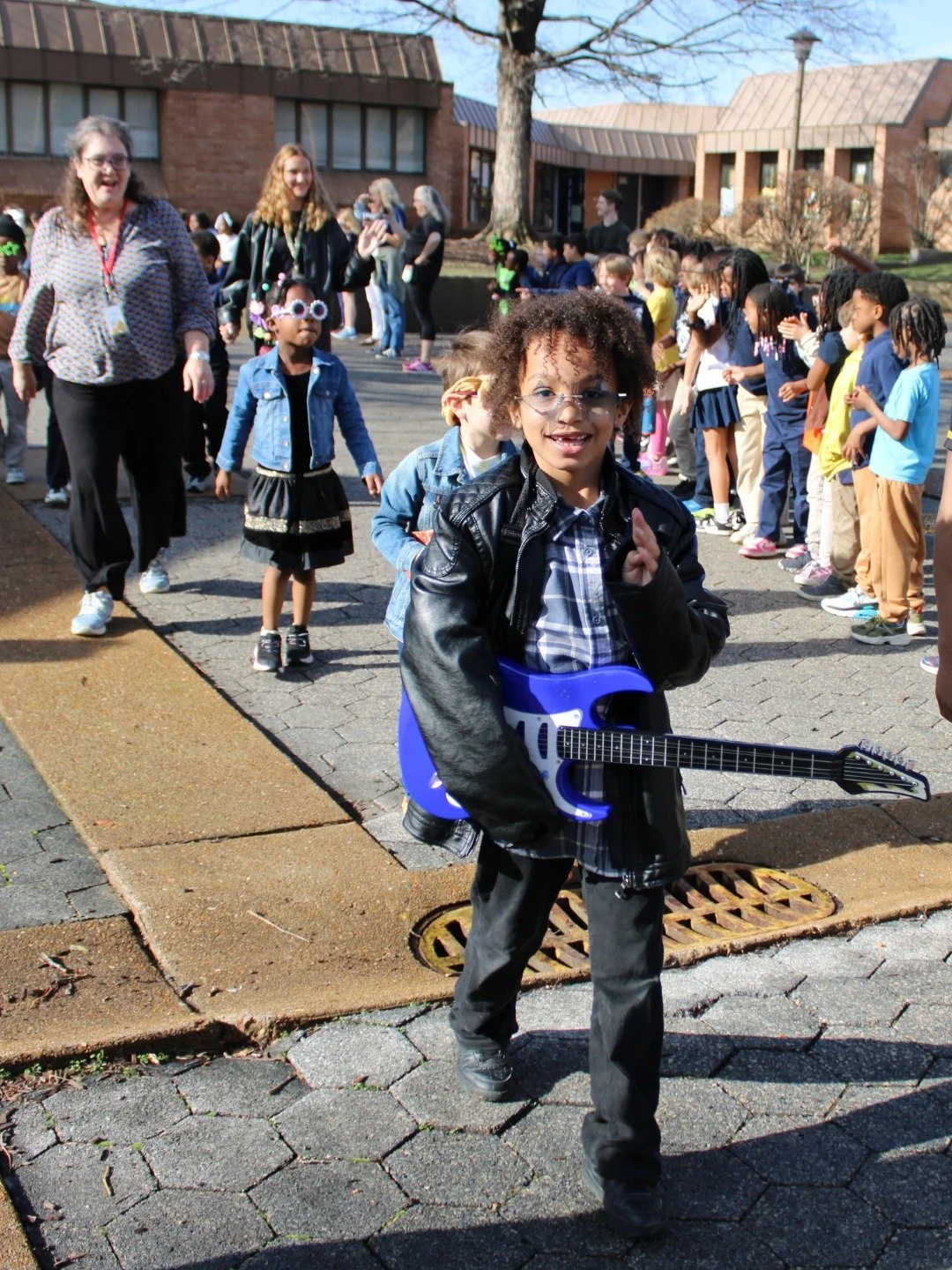 Our first graders rocked and rolled their way through 120 days of school on Friday! 🎸
Students paraded through the EC building and courtyard showing off their rockstar outfits while classmates and staff cheered them on. We love celebrating these big