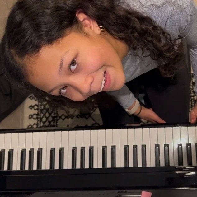 teaching chord progressions at the piano