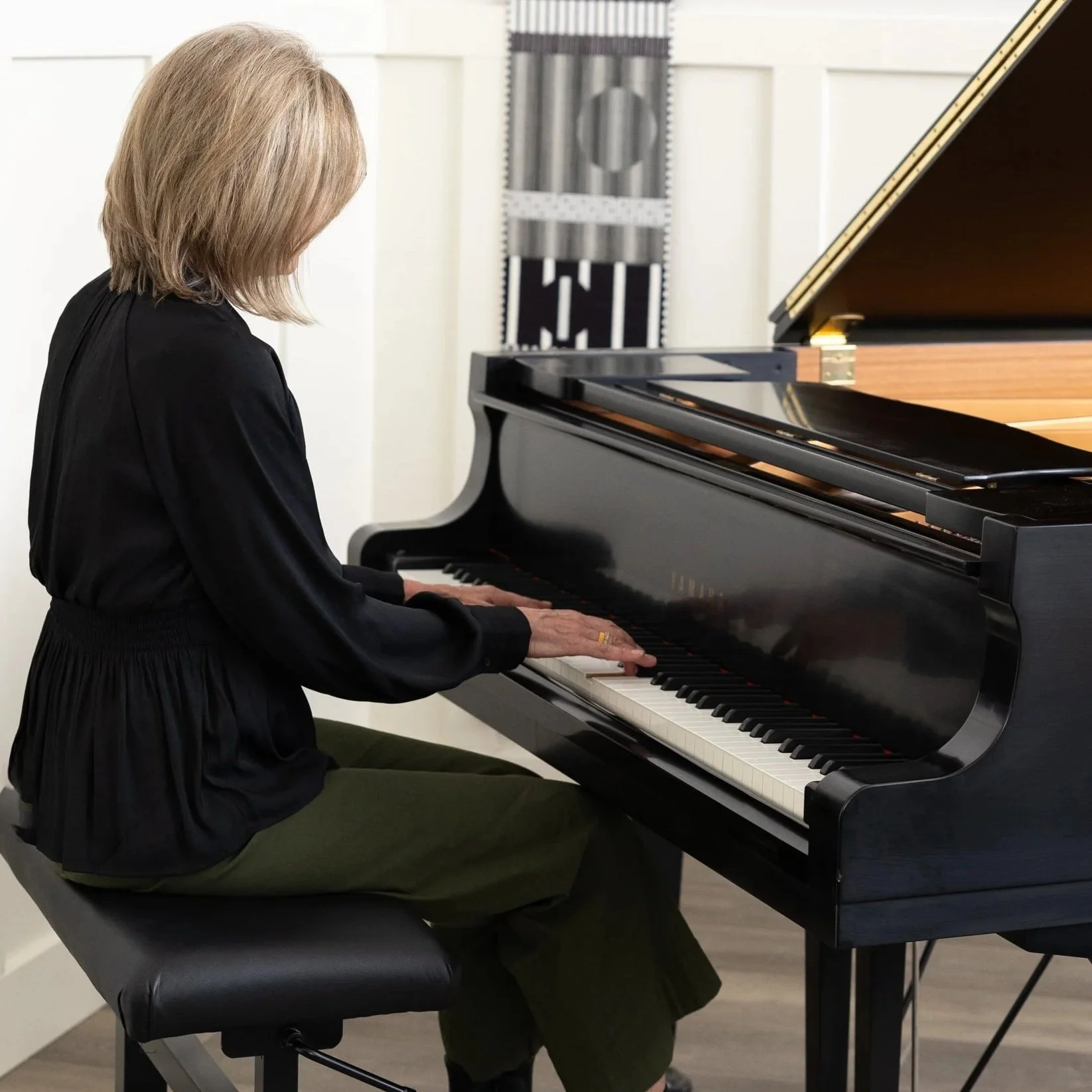 teaching chord progressions at the piano