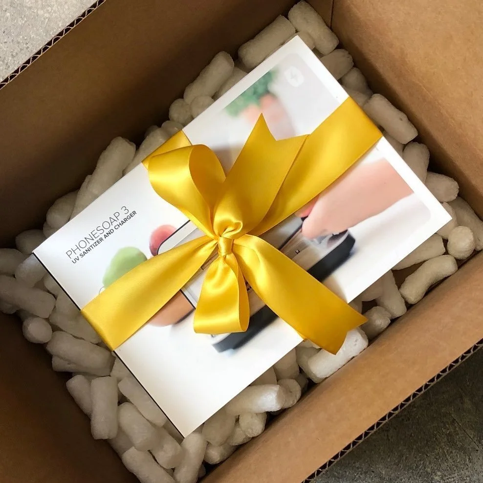 Send a bit of sunshine with a gift wrapped in a bold yellow ribbon. Our client @destinationconcepts used this fun color in recent gifting of the ultra cool @phonesoap for a virtual event. #gifting