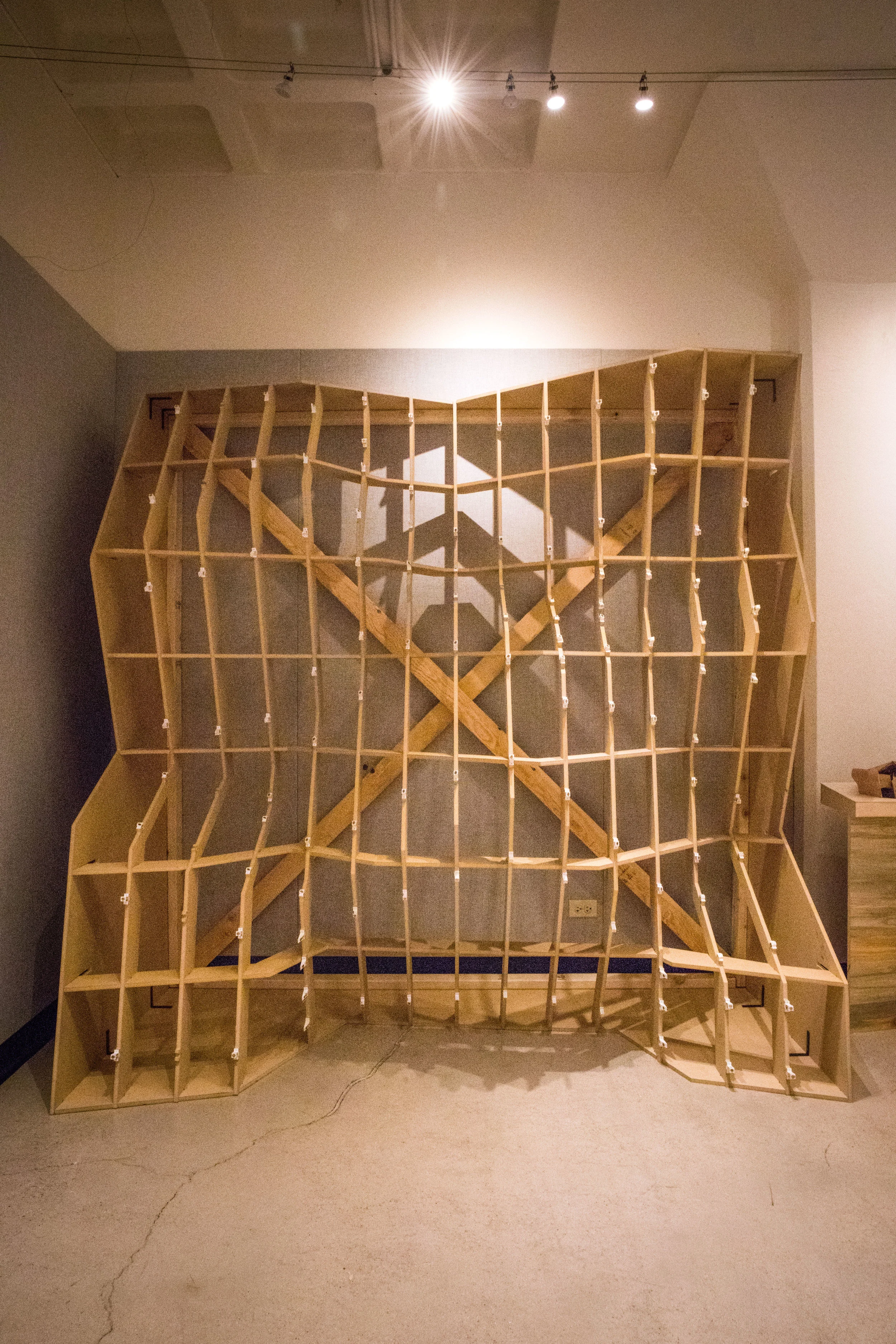 Object with panels removed, showing waffle structure and bracketing