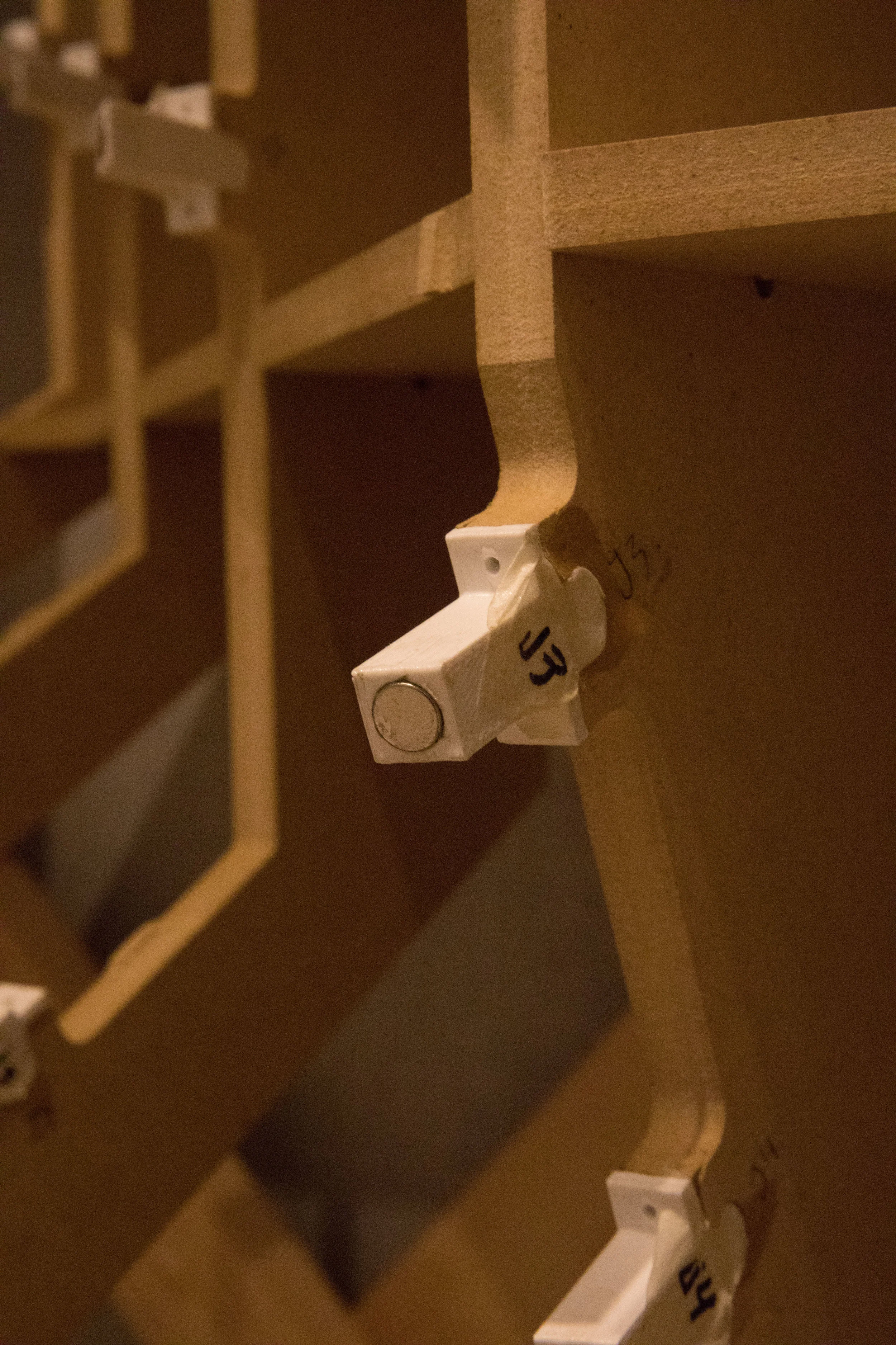3D-printed brackets with magnets attached