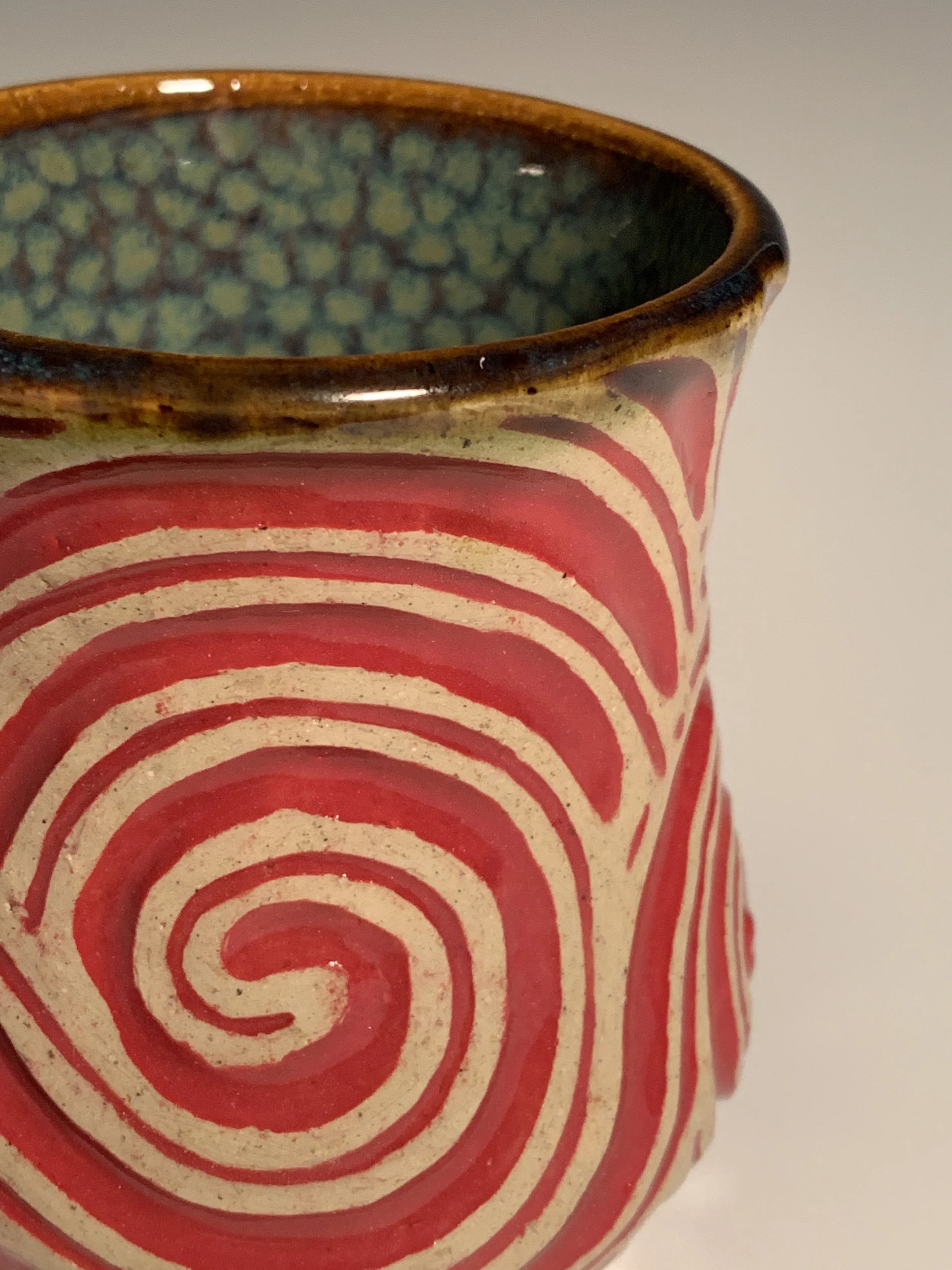 Red swirly cup