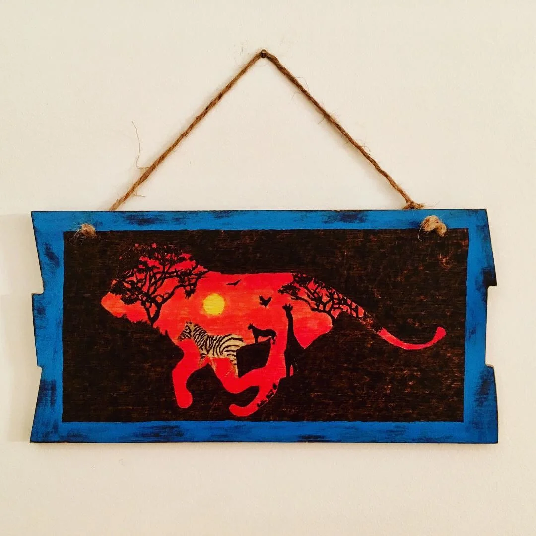 In this piece, I tried to show a representation of all African wildlife outlined by a lion.