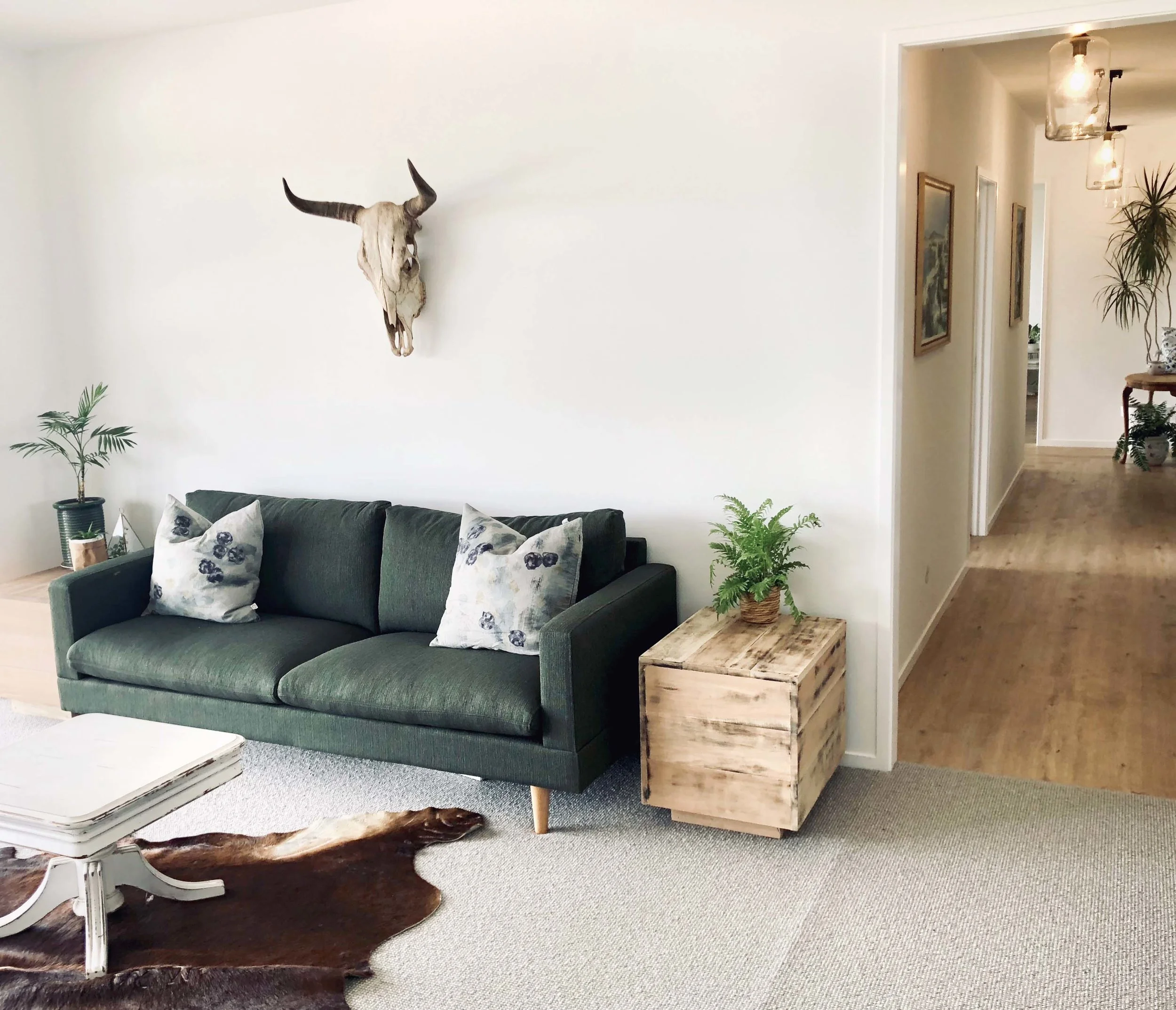   A major transformation from basic farm house, to modern barn house.   Inspired by the Nordic farm house design style, this large family home was designed for an active family of five, set in rural Waihi Beach. With amazing views of the ocean, and a private native bush at the doorstep, the interior finishes palette mimics the surrounding environment, using muted tones, layered textures and natural timbers to create a relaxed, and calming environment.     