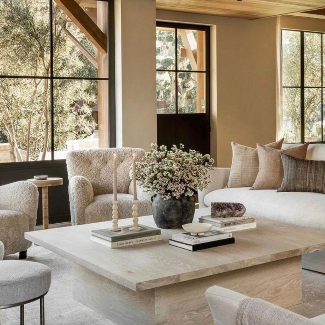 Embrace the warmth of home, where every corner whispers comfort and every detail wraps you in coziness. ✨ We love how this living room incorporates a tasteful array of neutral tones and combinations of textures that give the space a beautifully elega