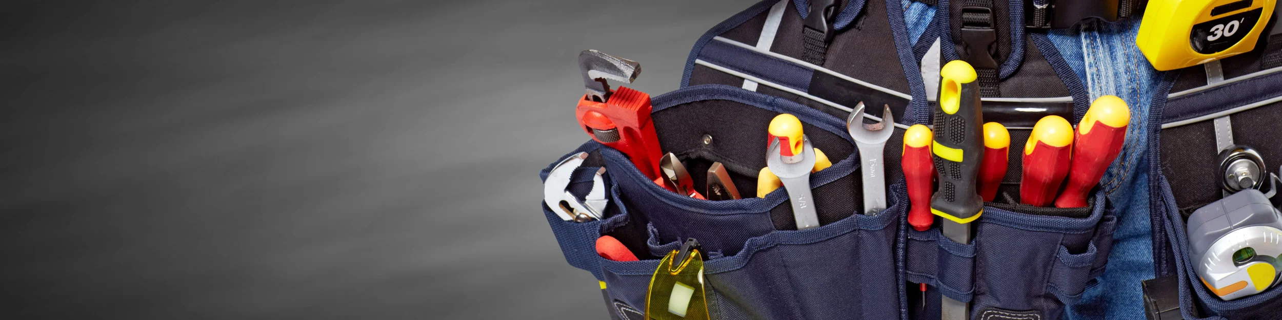 Tool belt with construction tools.