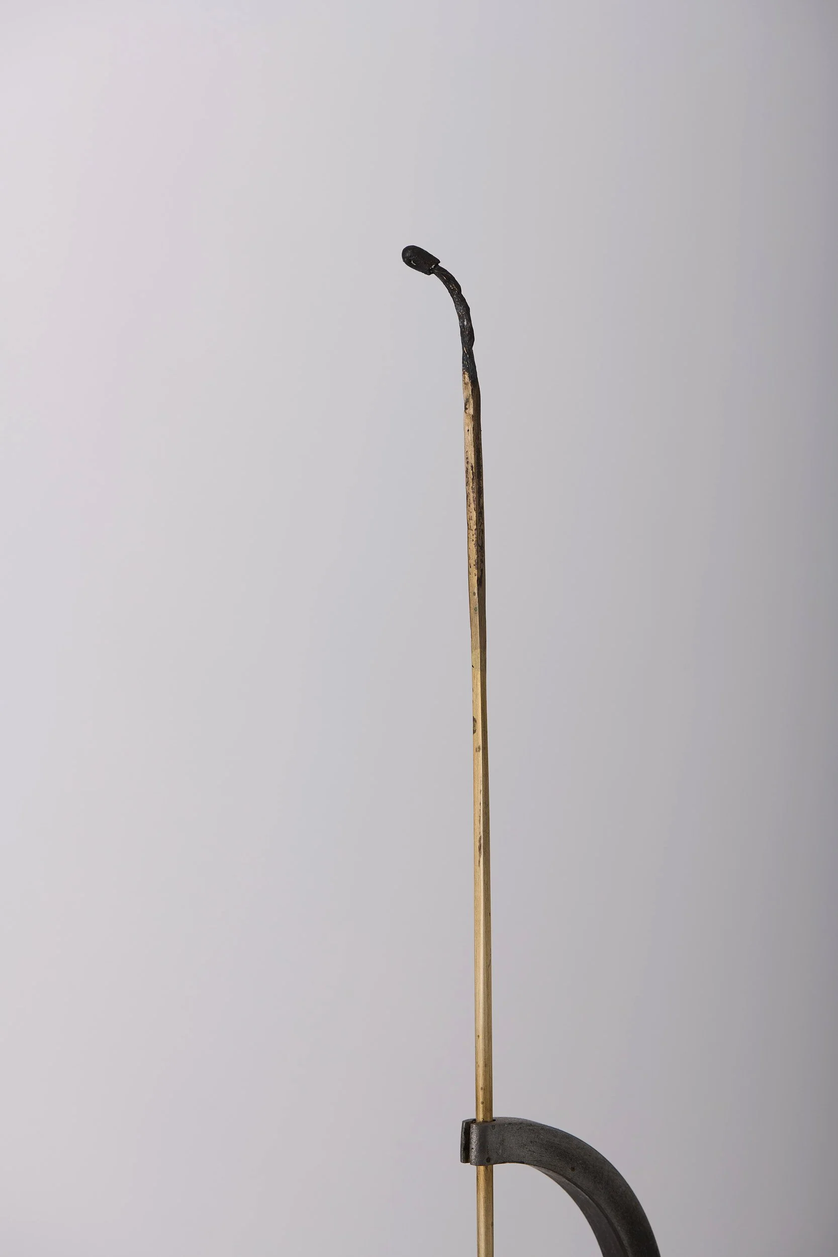   Charred, but held , 2025 (detail) bronze, brass, mild steel 131 × 11 × 11 cm 