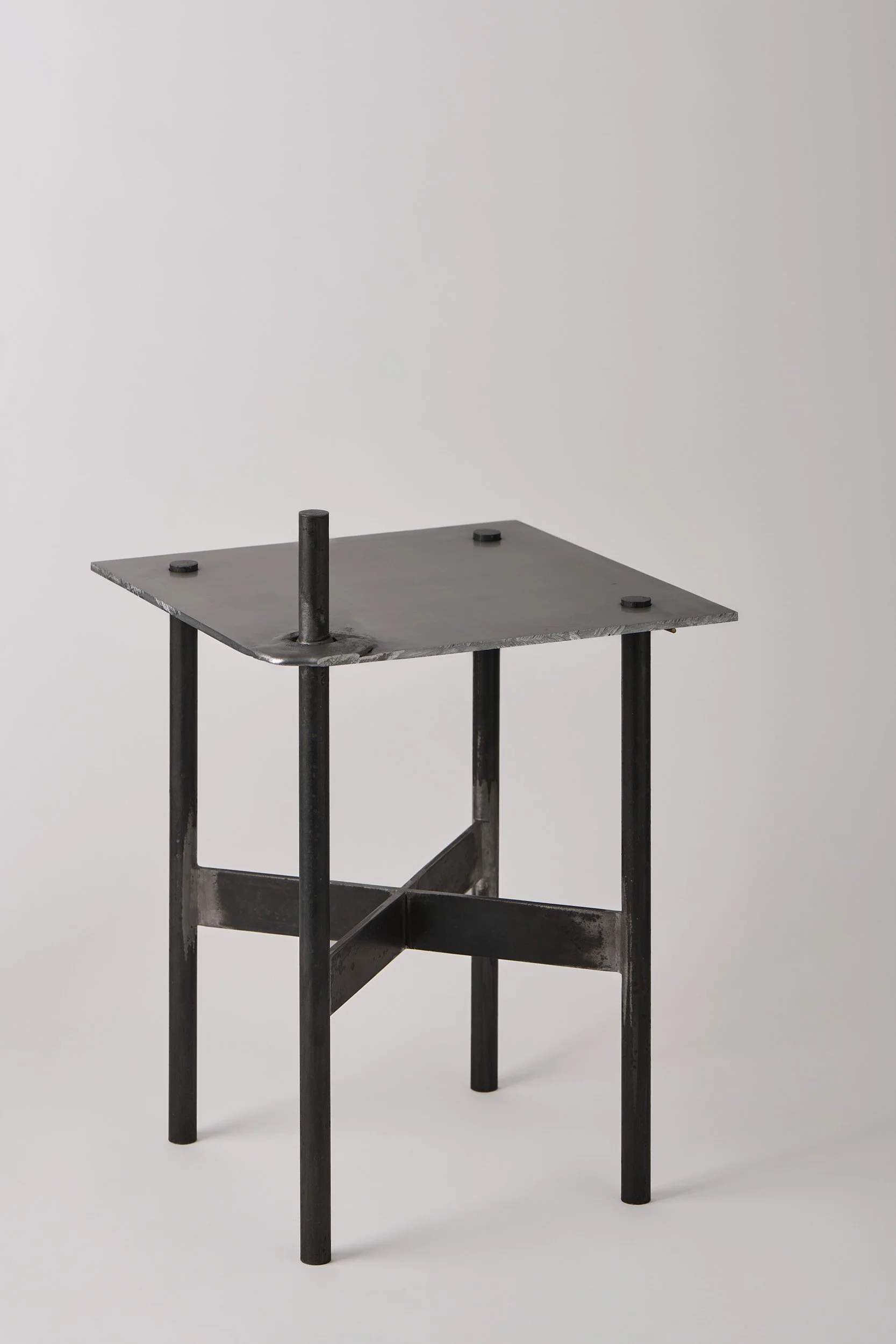   Pierced side table , 2025 aluminium, mild steel 48 × 34 × 34 cm  I Commission available through Stockroom I  