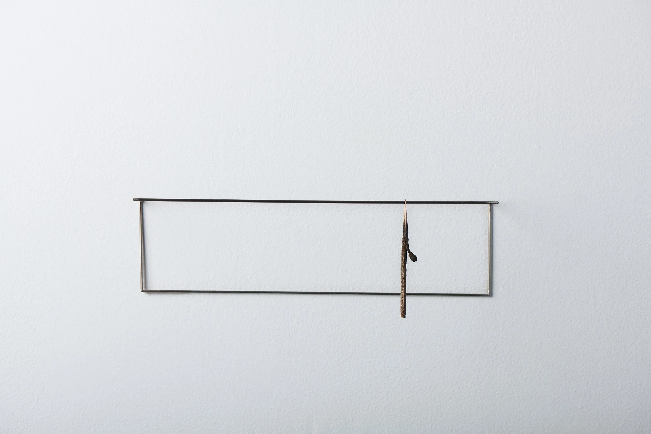   Slumped match , 2025 bronze, stainless steel 10 × 30 × 8 cm 