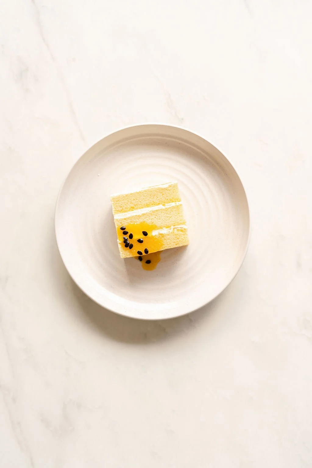 Passionfruit, Orange &amp; Elderflower 🍊✨
One of our most popular cake flavours,  it&rsquo;s been on the menu for over four years now and we simply can&rsquo;t take it off. 

Cake Tastings available next Saturday 17th October. ✨

@sieveandstone 

#s