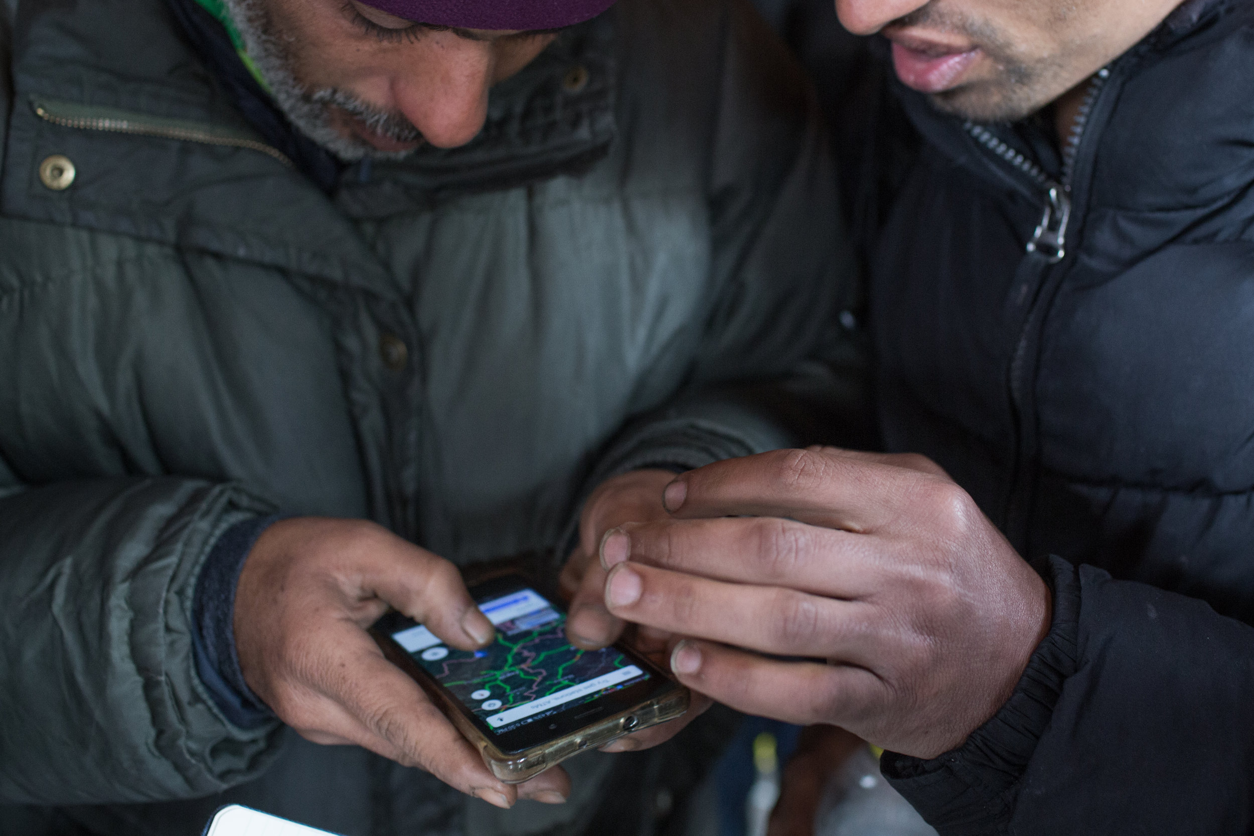  With the help of navigation migrants are looking for the way to the Croatia, Velika Kladuša, BiH. 