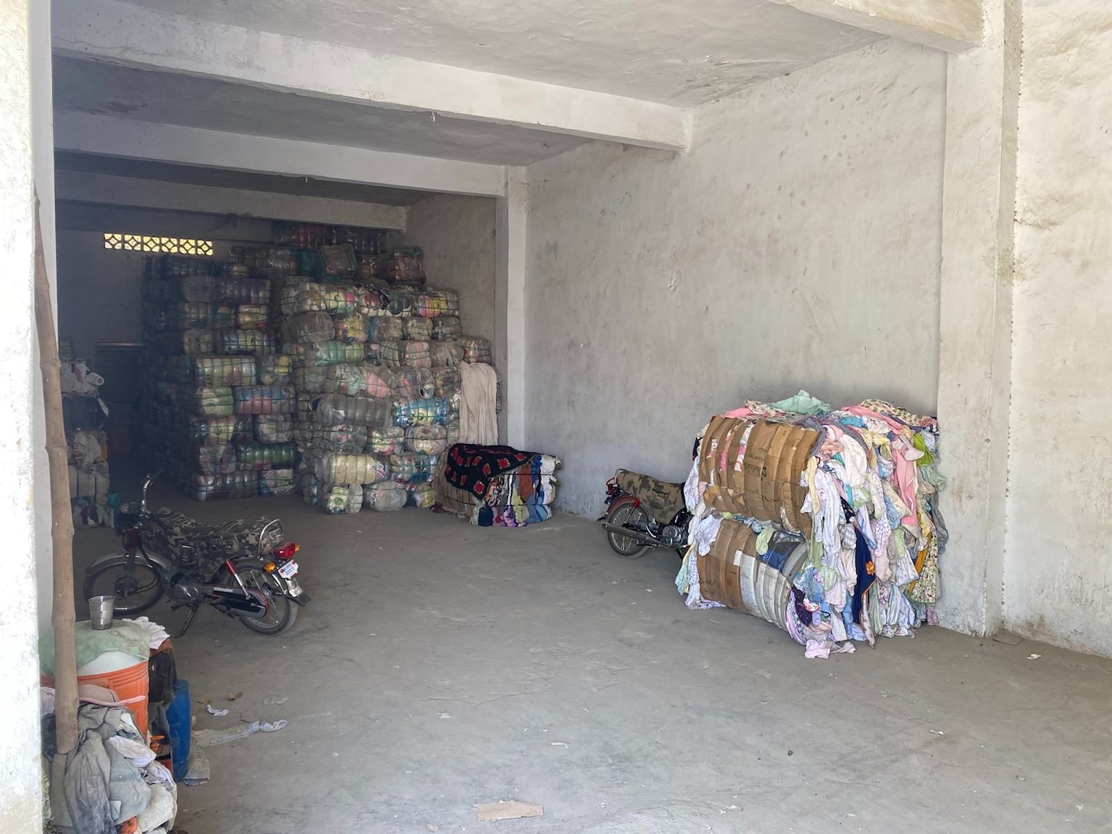  The warehouse of one of the importers of second-hand textile at Shershah Market from where Oštro received a signal from the backpack. Photo: Adil Jawad 