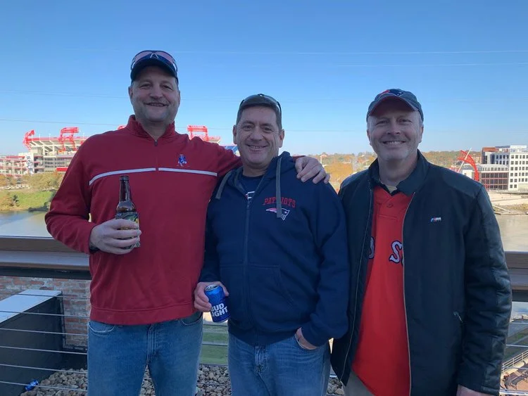 Alumni Mike Skiotis (84) Keith Hill (85) and Mark Smith (86) meet up in Nashville for Patriots game!