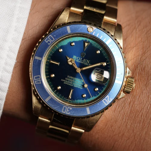Rolex Submariner Reference 16808 in 18K Yellow Gold w/ Blue/Teal