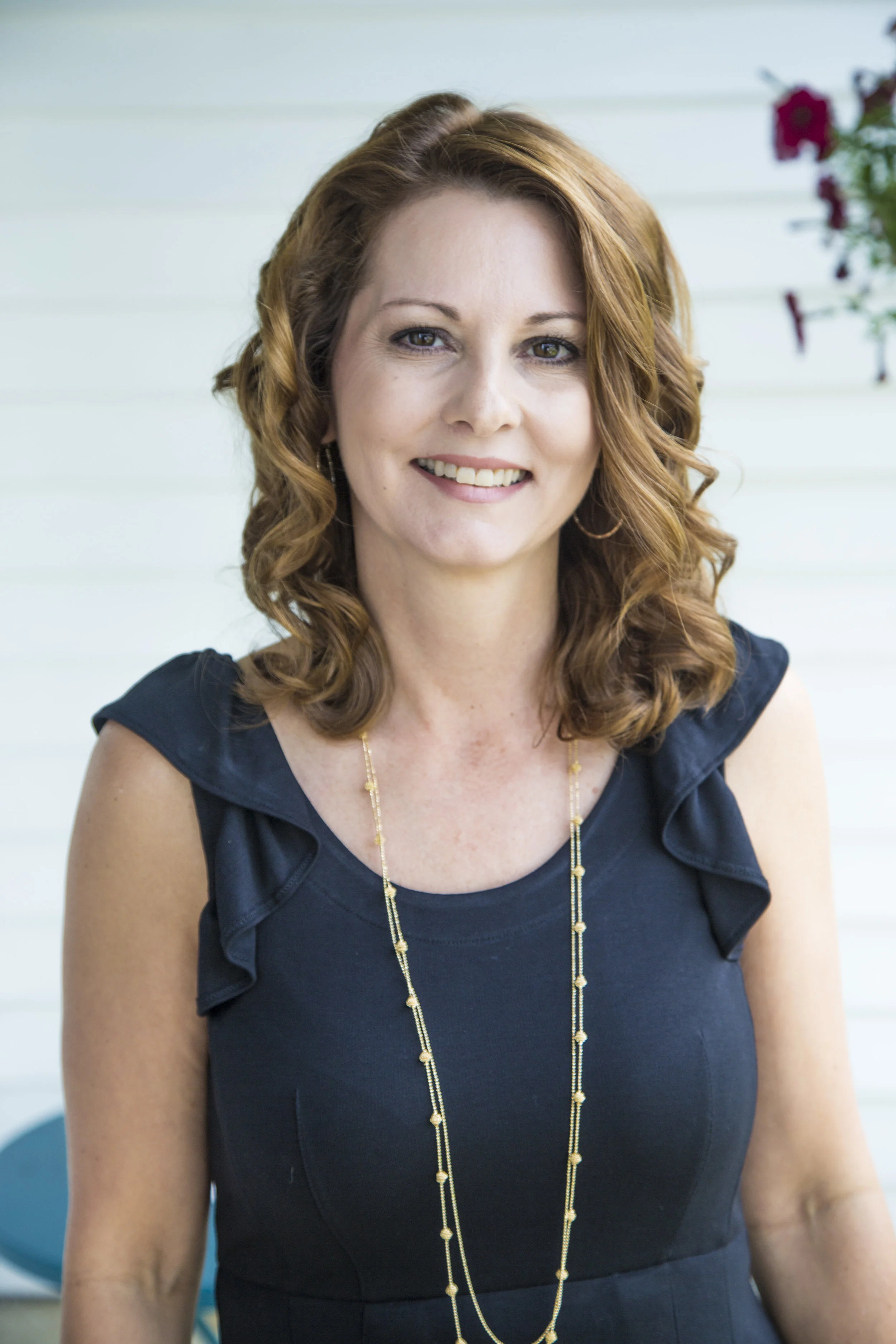 Kim Fox, Owner and Lead Coordinator of Thee Draper Village Wedding & Events Company