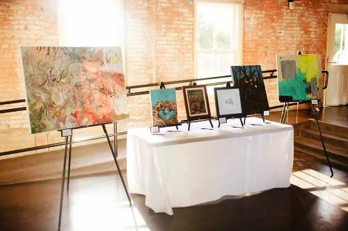 Art from the silent auction by Erika Huddleston, Jenny Grumbles, Kenton Visser, Tiffany McAnarney, Mark Renner, and Nicole Morrow