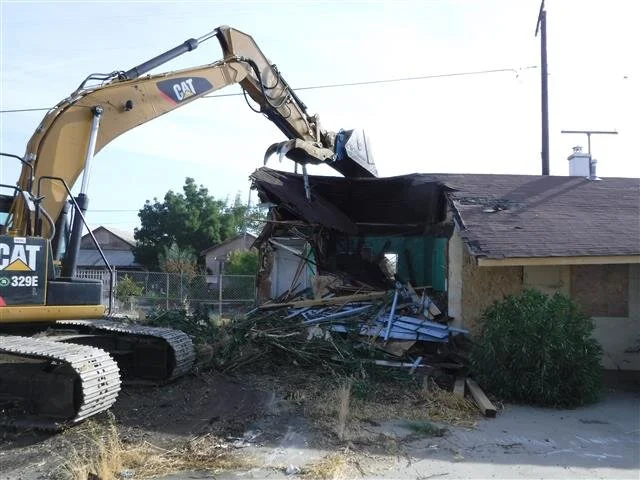 Little Value, but a Big Community Issue: Remediating a Blighted, Low-value Motel and Family Home