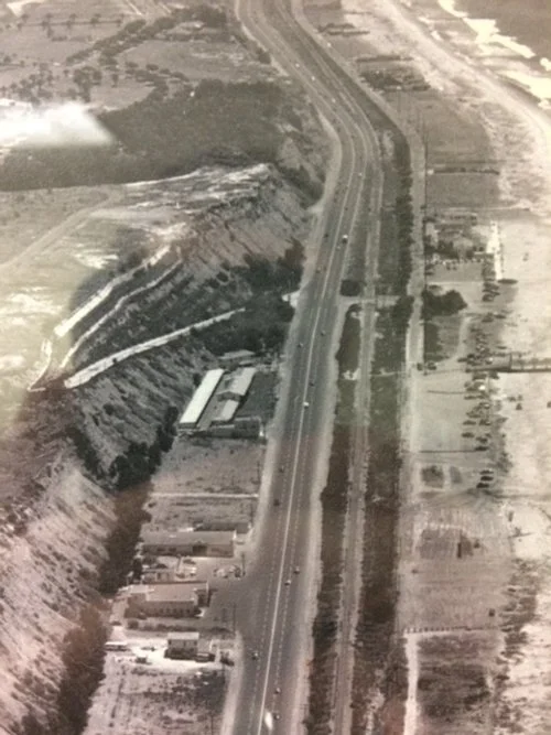  Aerial view of the Seaside Inn and Pacific Coast Highway, looking south. 