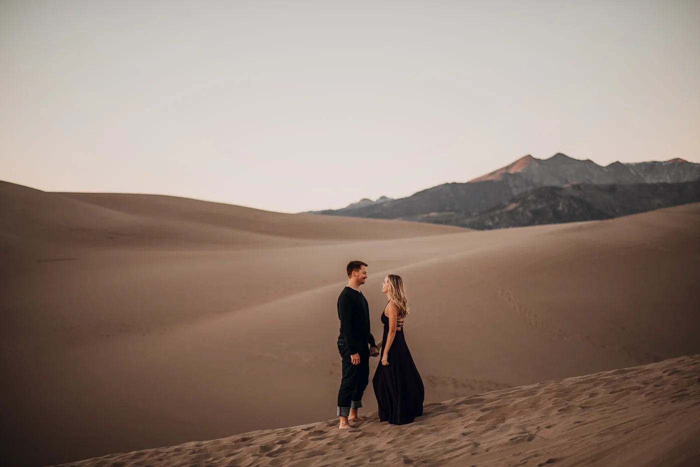 Great Sand Dunes Engagement Session PHOCO Photographer Colorado Flowy Dress Dark Moody-12.jpg