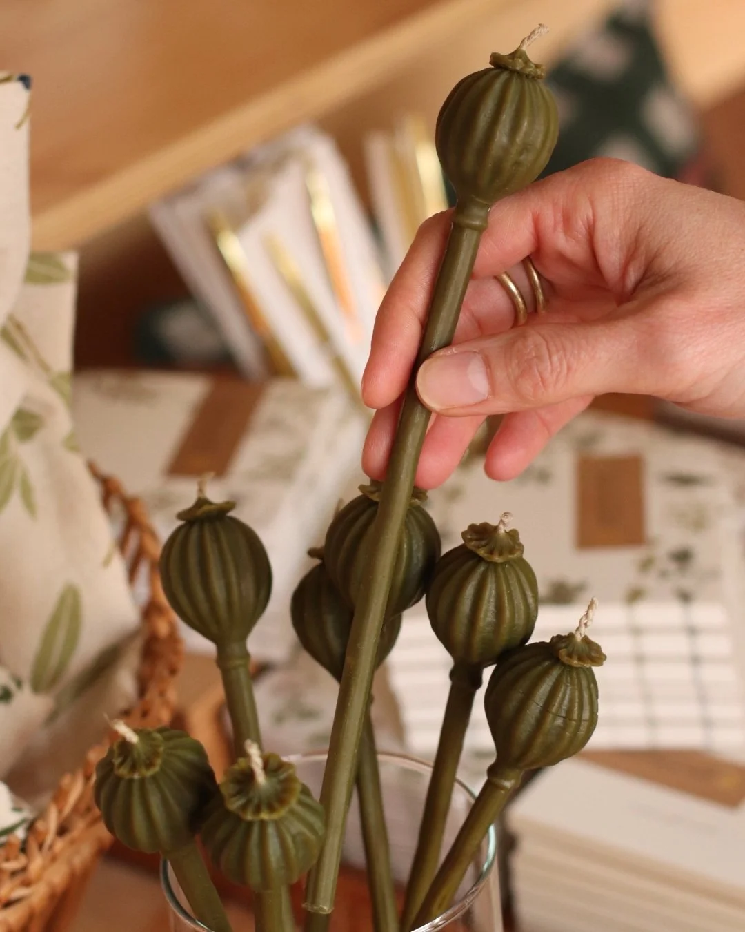 Handmade locally with locally sourced beeswax- these poppy pods will be a conversation starter + they smell awesome! 

 #dunegiftandhome #duneinterior #momandpopshop #midwestboutique #homedecorideas #hometrends #homegoods #giftshop #MadisonWI #Stough