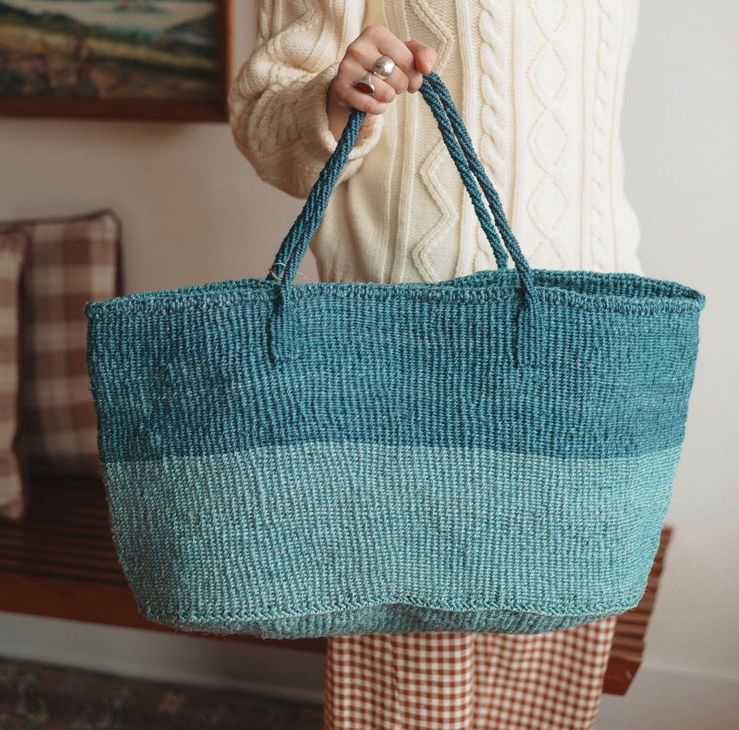 The Mom Tote! 
"This sisal, woven tote is handmade by a weaving cooperative in southeastern Kenya. The women hand-dye the sisal fibers and weave them into these beautiful works of art. This tote is great for an overnight trip or for everyday use