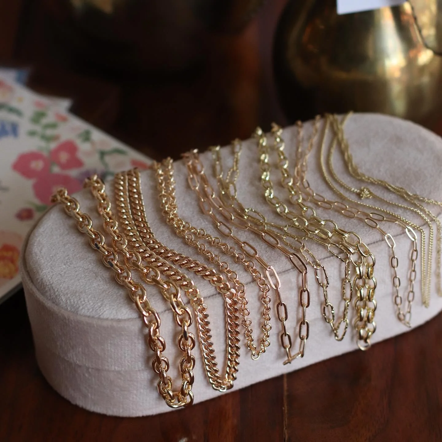 New a new chain? We have so many new styles in a mix of metals from 14k Gold filled, to gold plated, solid brass and stainless steel! We also have a ton to fun charms for add to your chains! Come discover in shop and online your new go to neck bling!