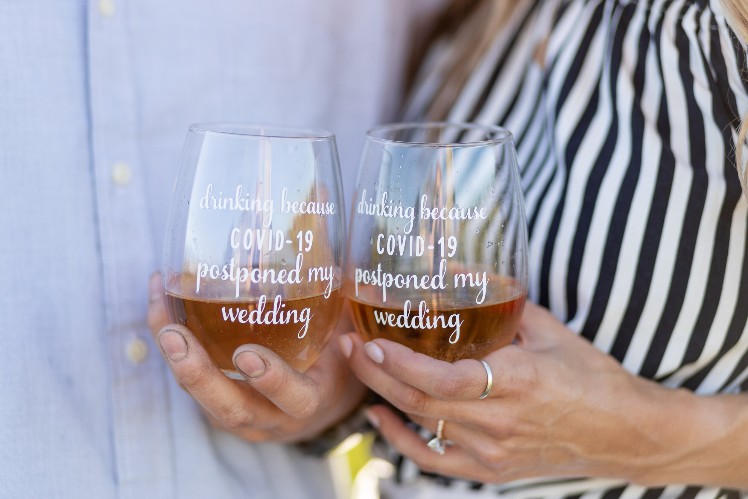engaged couple with COVID wine glasses at Fonferek Glen Green Bay Wisconsin