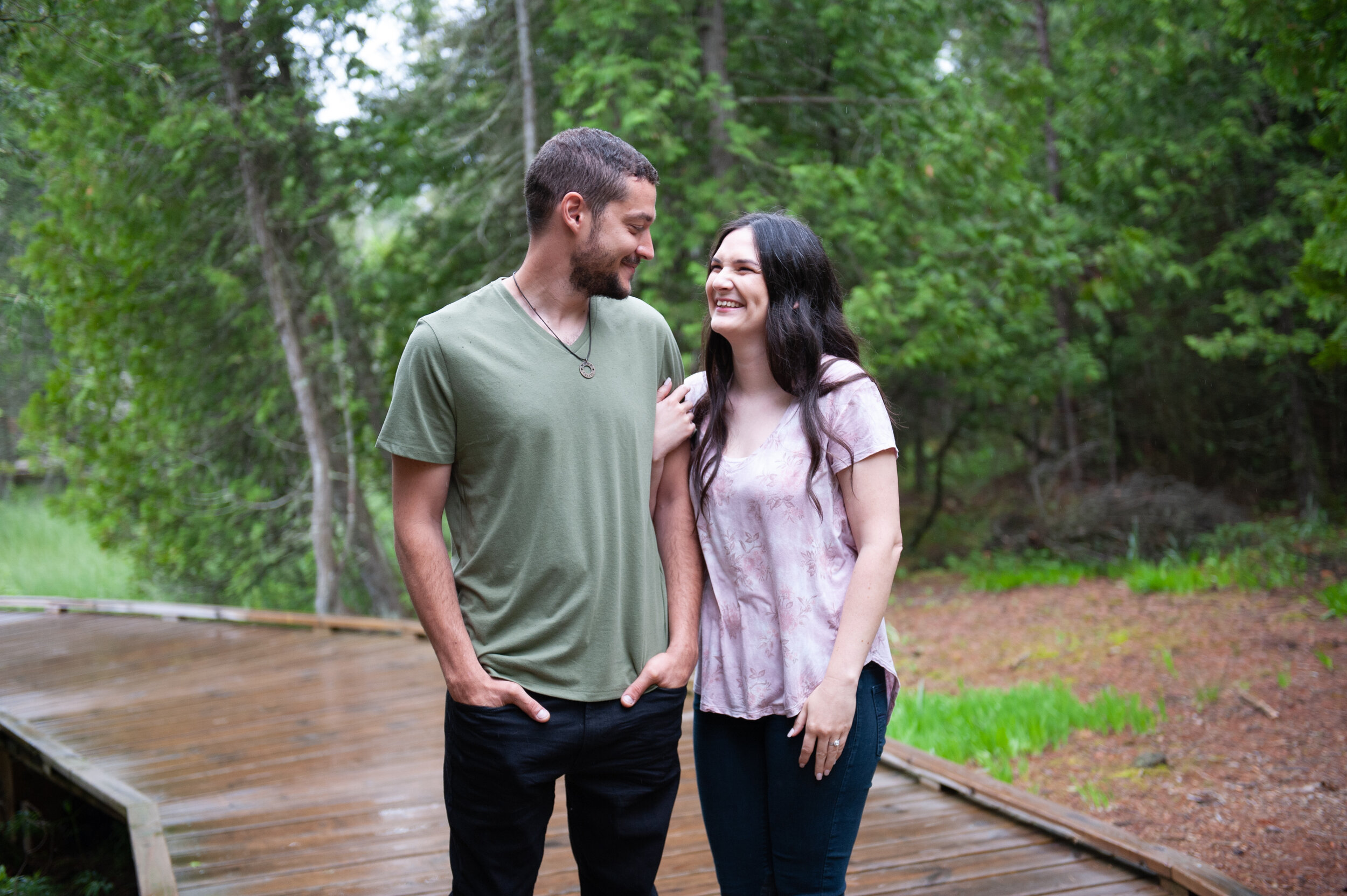 Natural spring summer forest engagement session in rain