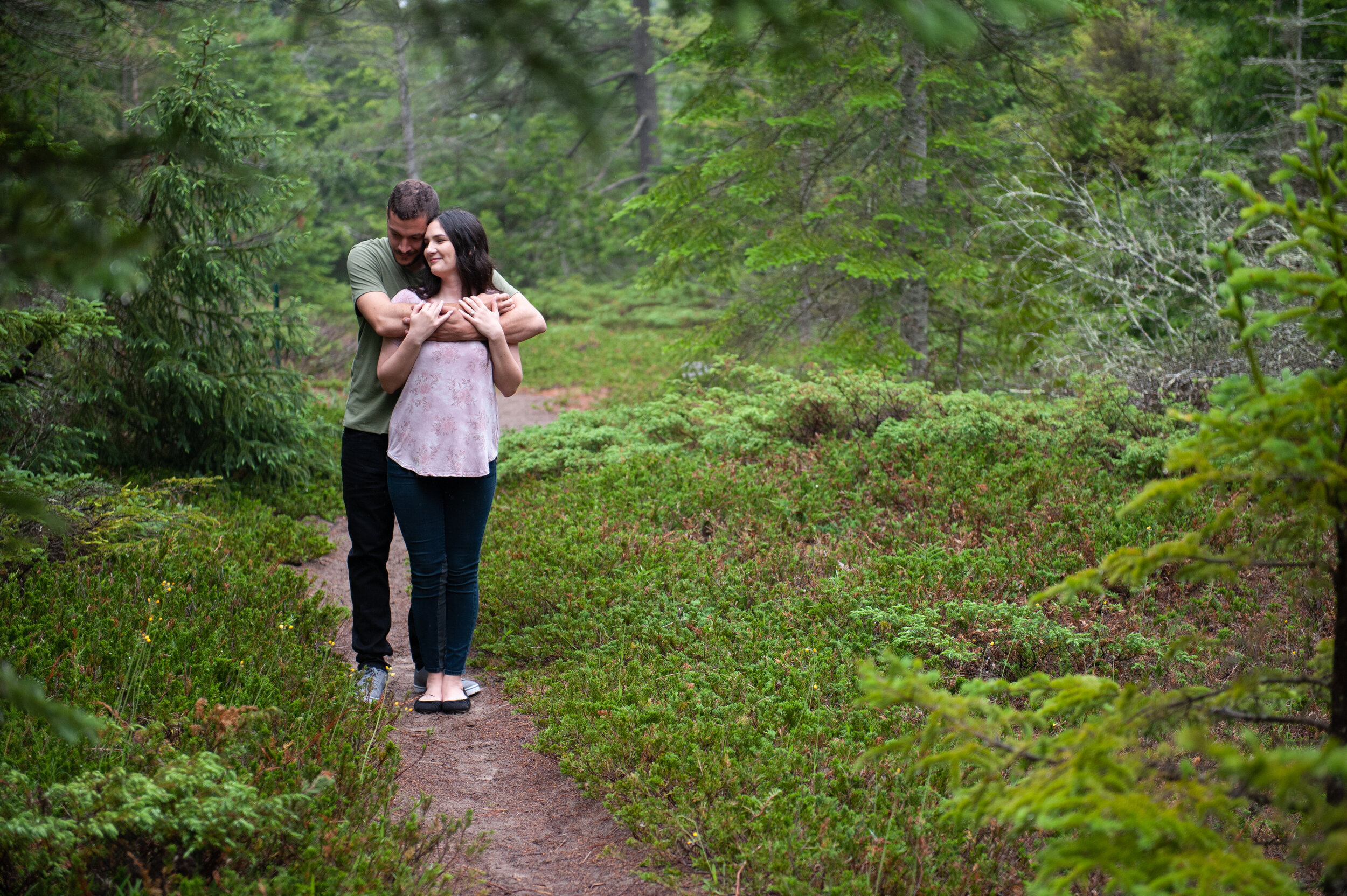 Natural spring summer forest engagement session in rain