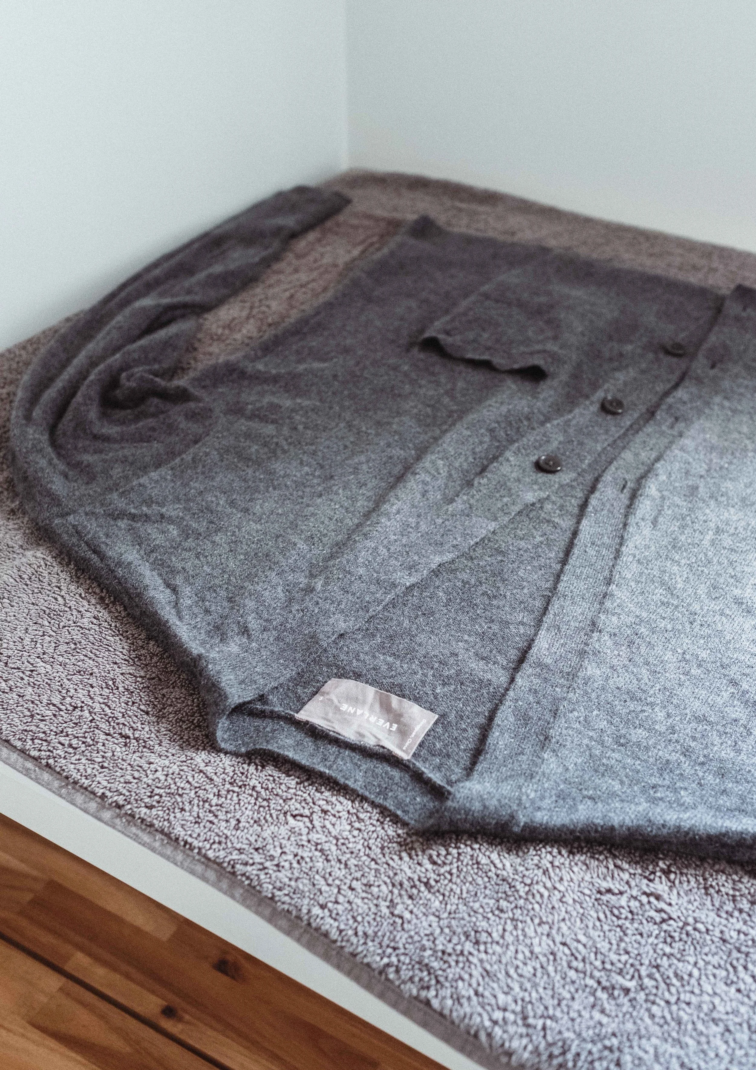 Step 9: finally, reshape your sweater again and lay it out on the towel to dry