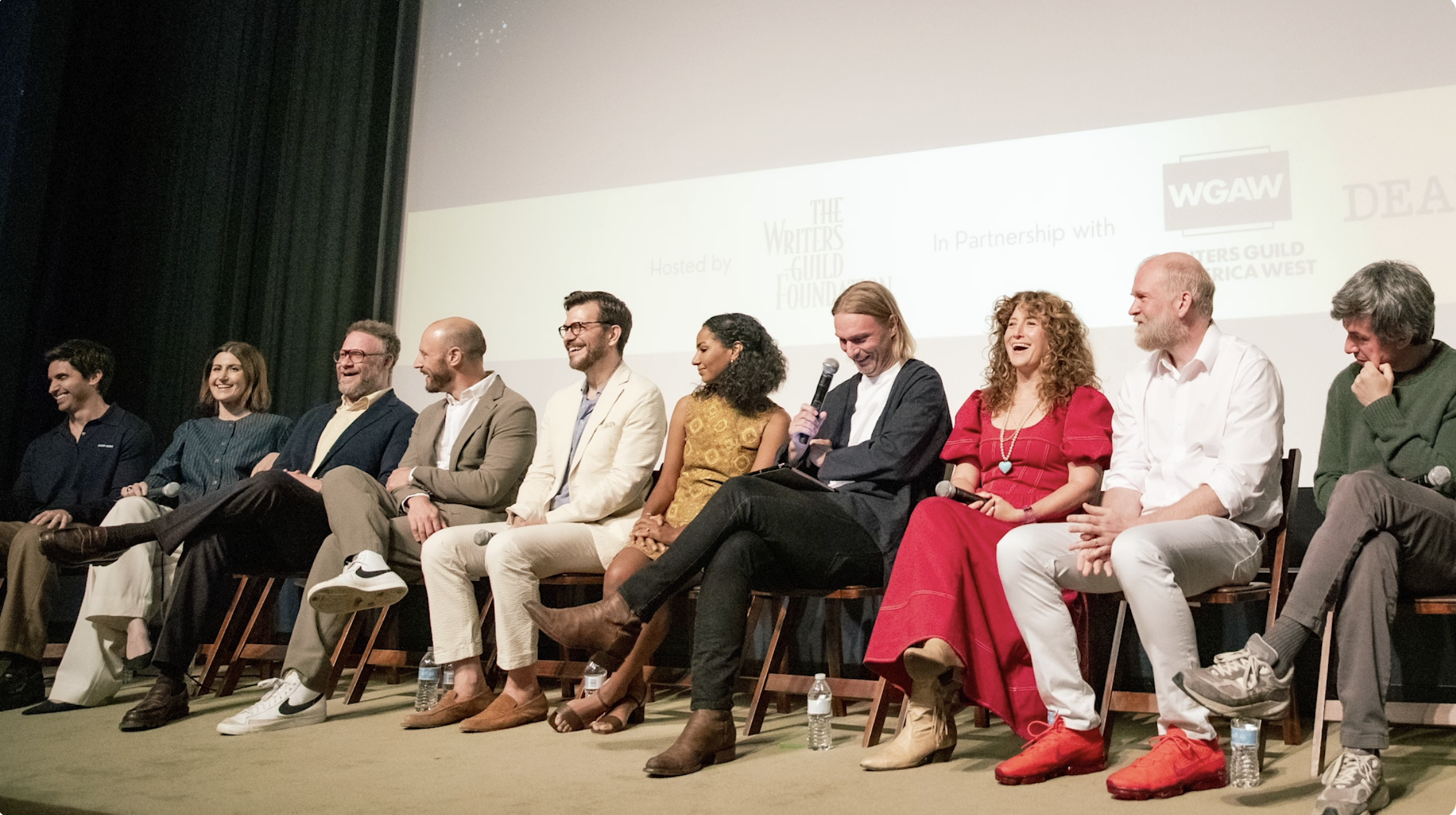 A panel of writers sits on stage at our annual event, Sublime Primetime