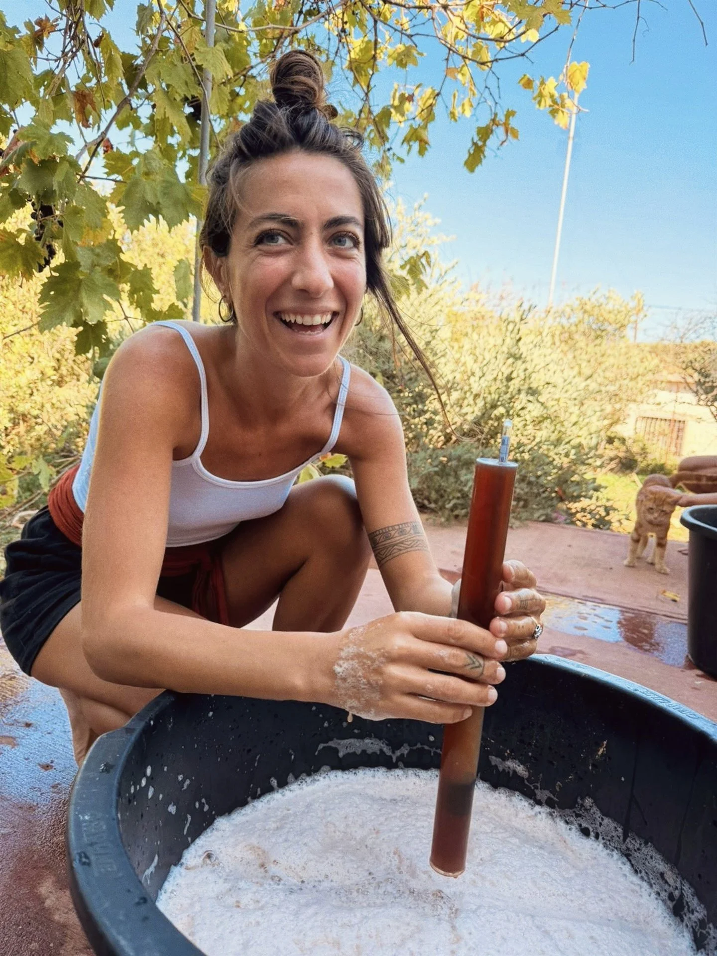  paulina making tannin tea for the sheepskins to be tanned 