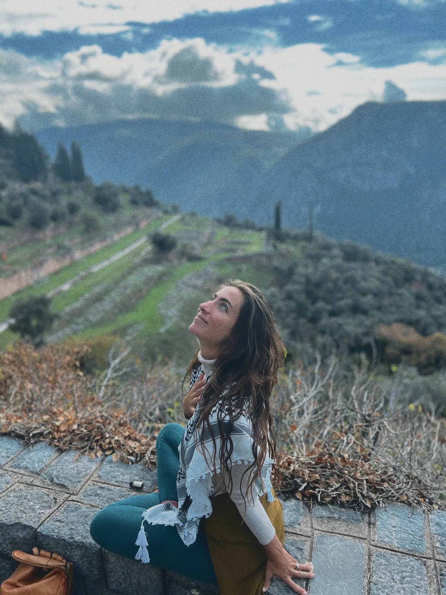  paulina prana in front of the temple of athena pronoia in delphi, greece 