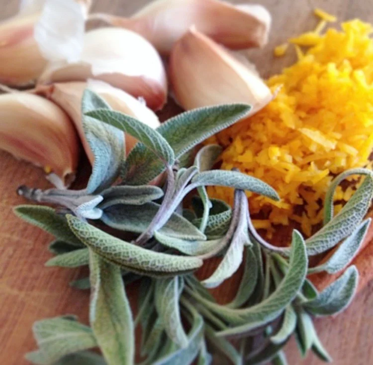 Roast chicken in milk with garlic, sage, lemon and cinnamon