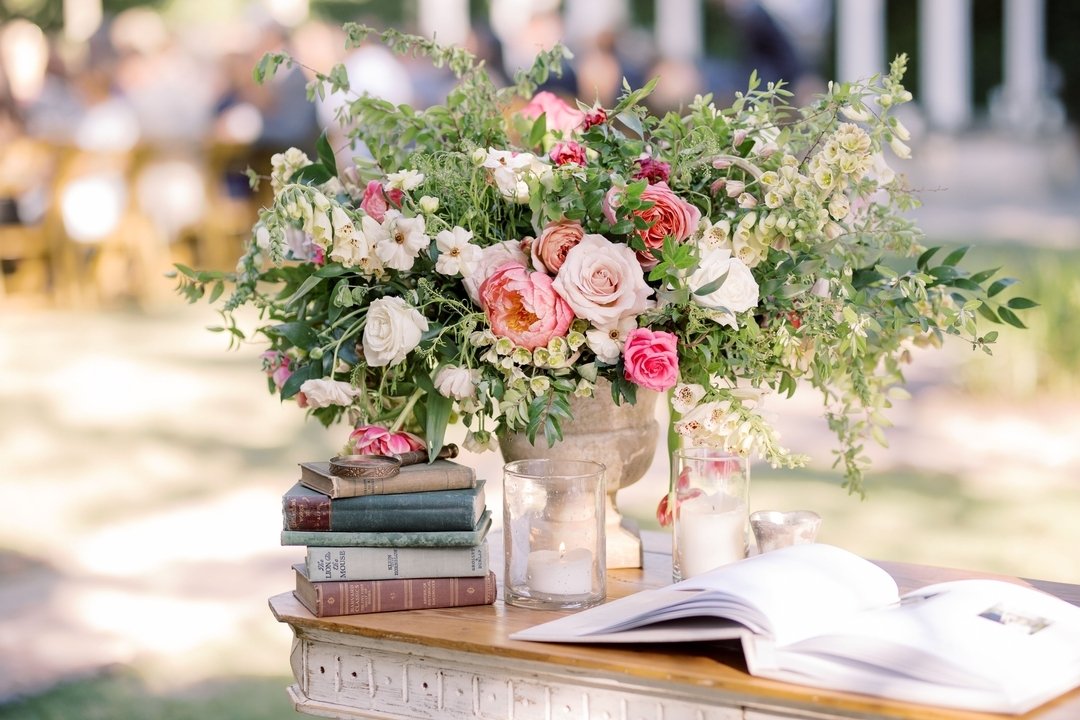 The perfect welcome for your guests, complete with antique books. 
Photographer: @jennamarieweddings 
Planning &amp; Design: @boutiqueplanning 
Venue: @pphgevents