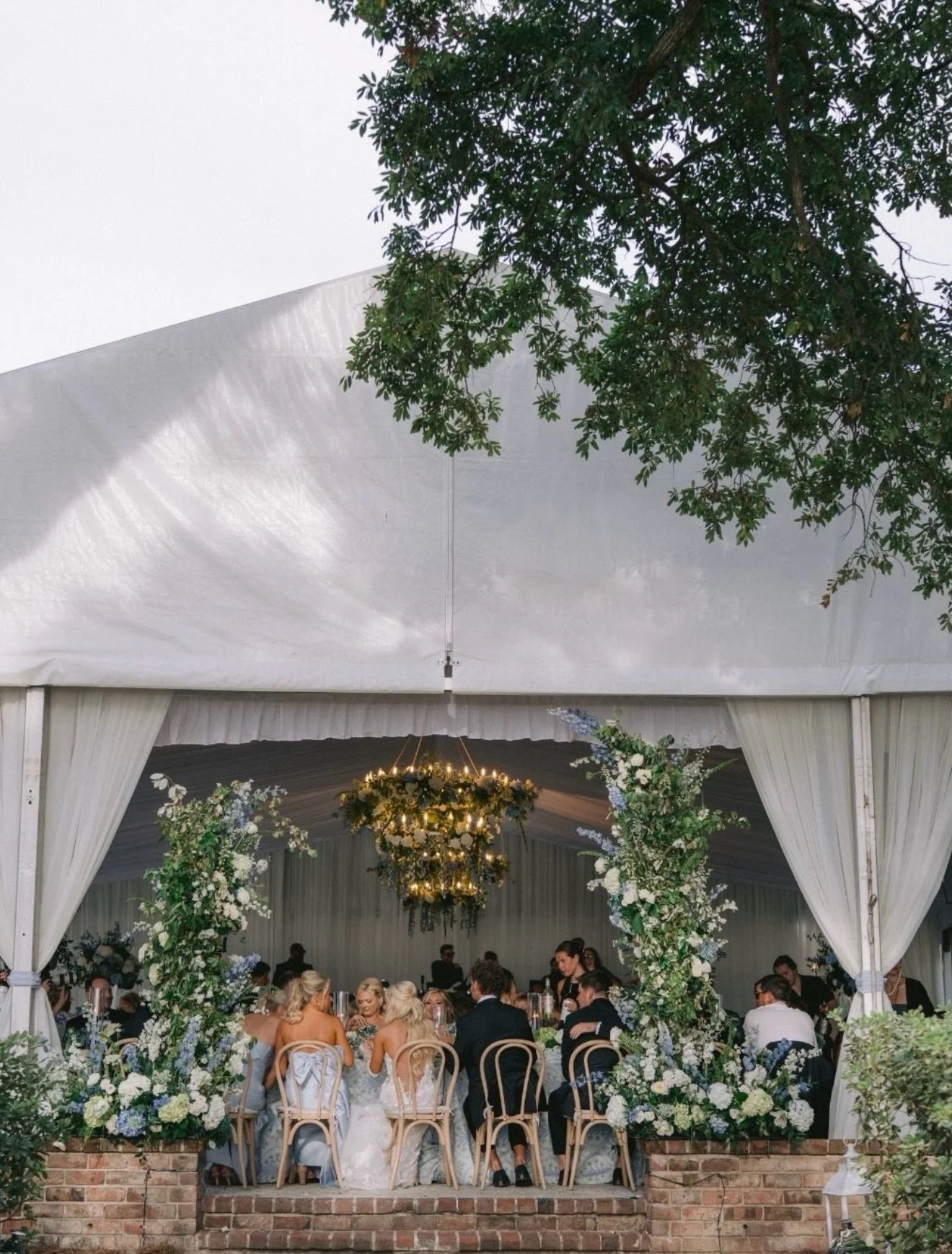 The Whiteheads at Lowndes Grove 💙

Blue and white will always be a favorite of ours, and this one might be our best yet. Hydrangeas spilling everywhere, garden roses tucked in, delphinium reaching for the tent ceiling. We dressed the arbor, lined th