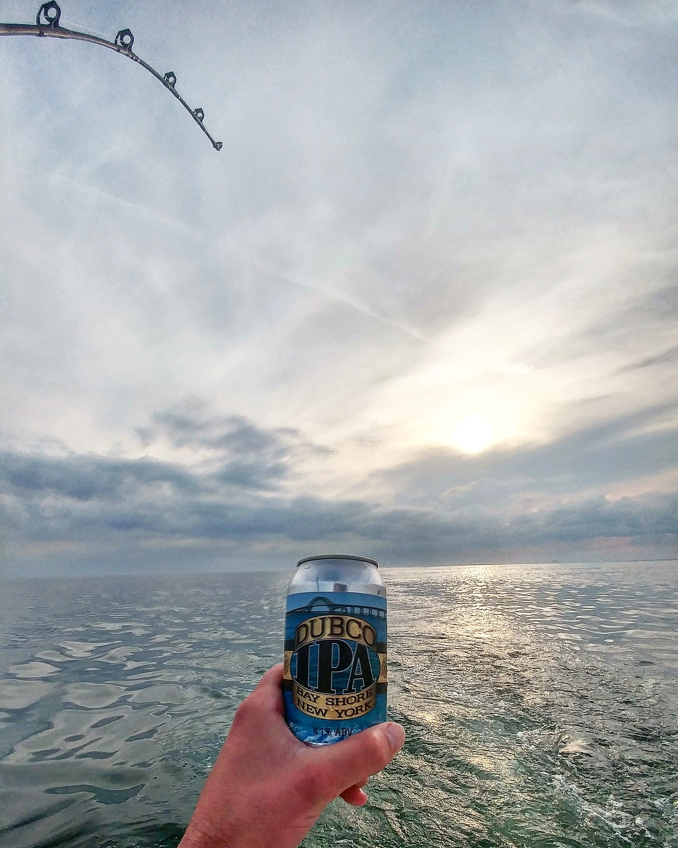  Enjoying a DUBCO IPA on the open waters of Long Island, fishing for Striped Bass. 