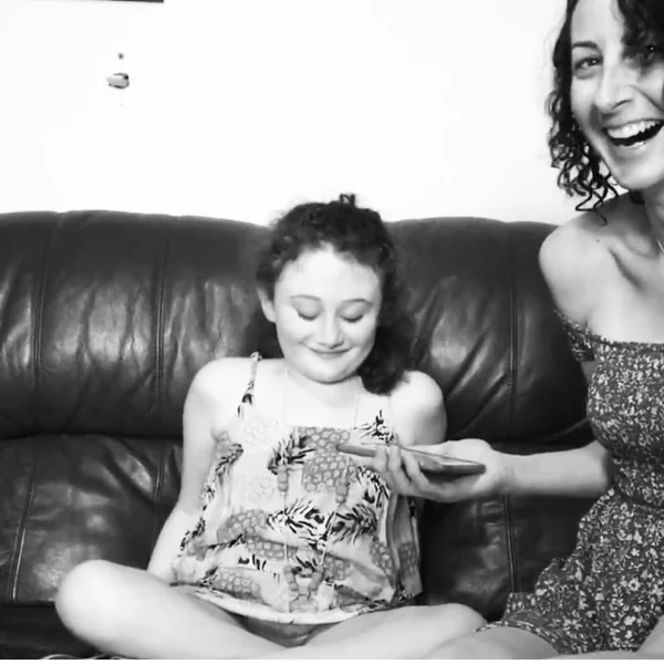 An artist specifically recorded a Christmas song for Mackenzie. This is a photo of us smiling, listening to the song that was loaded on Instagram on Christmas Eve