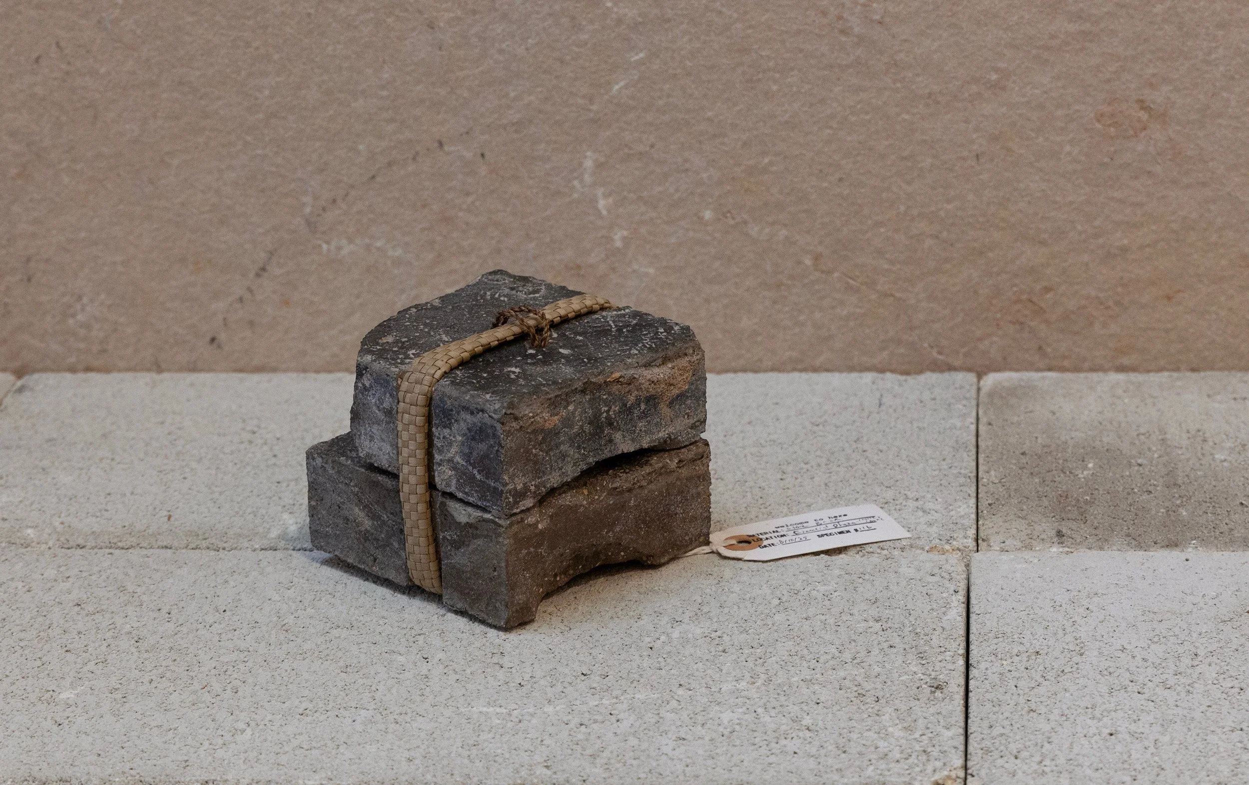   #106.116.124   Lauhala (pandanus) and stone bricks from Waikahalulu / the Castle &amp; Cooke Financial Plaza, niu (coconut fiber) from Puʻuloa / Pearl Harbor  4 x 4 x 4 in. 