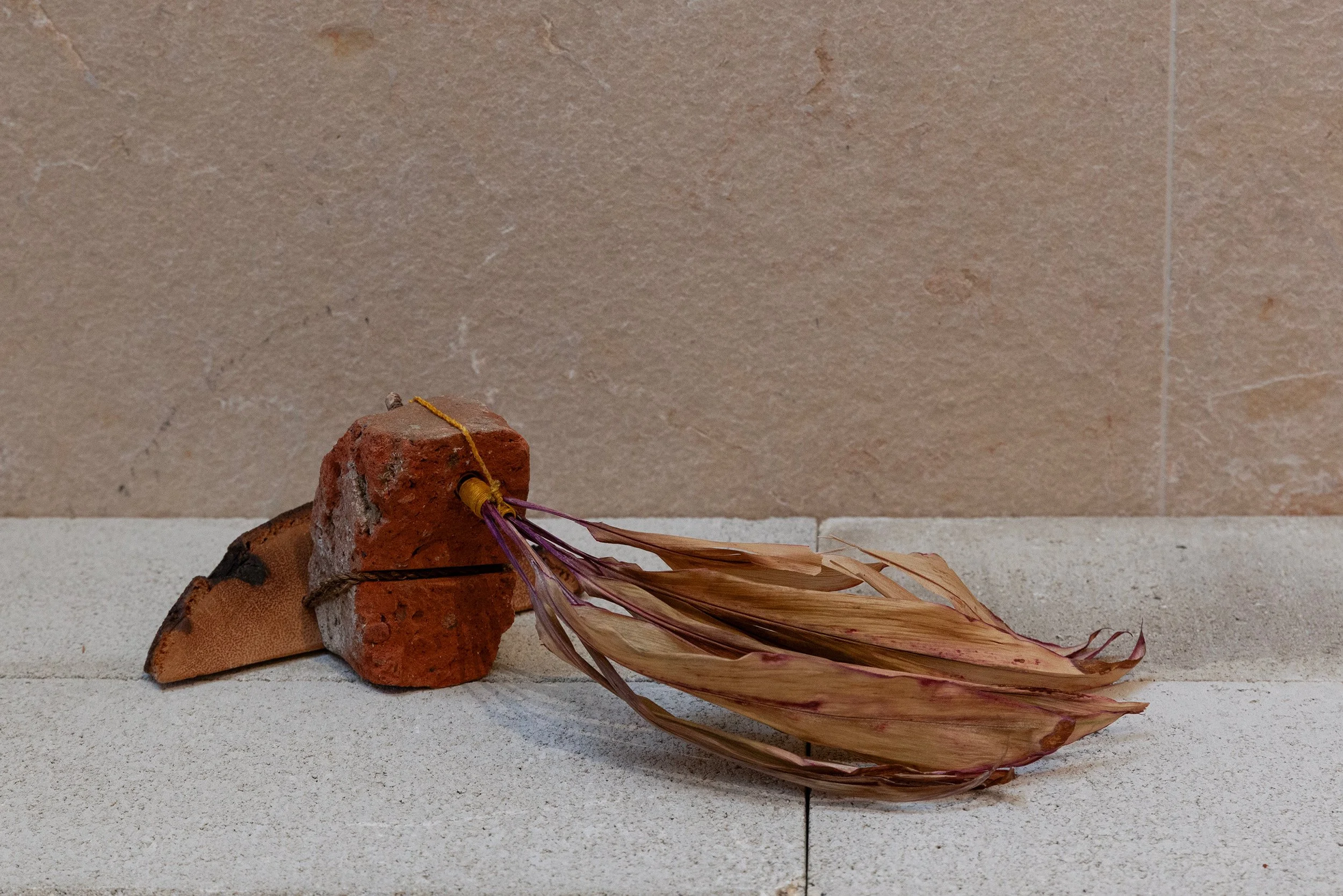   #106.121.126.122   &nbsp;niu (coconut fiber) from Puʻuloa / Pearl Harbor; niu (palm wood), brick, and lāʻī (ti leaf) from Waikahalulu / the AMFAC building,&nbsp; waxed linen thread, paint  16 x 15 x 8 in.&nbsp;&nbsp; 
