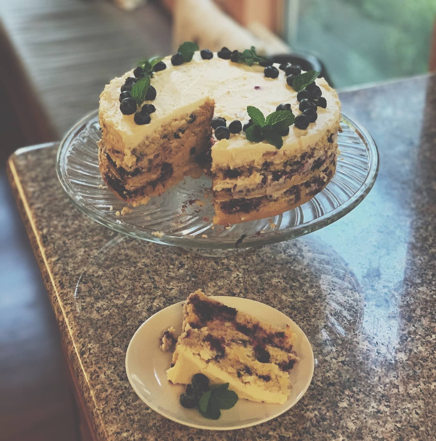 Lemon blueberry coconut cake for spring 🍋🫐🍃 

The backstory behind this cake is a bit convoluted. On Friday I was in a funk after several work meetings and new writing deadlines. So to cheer myself up (naturally!) I decided to watch BTS concert vl